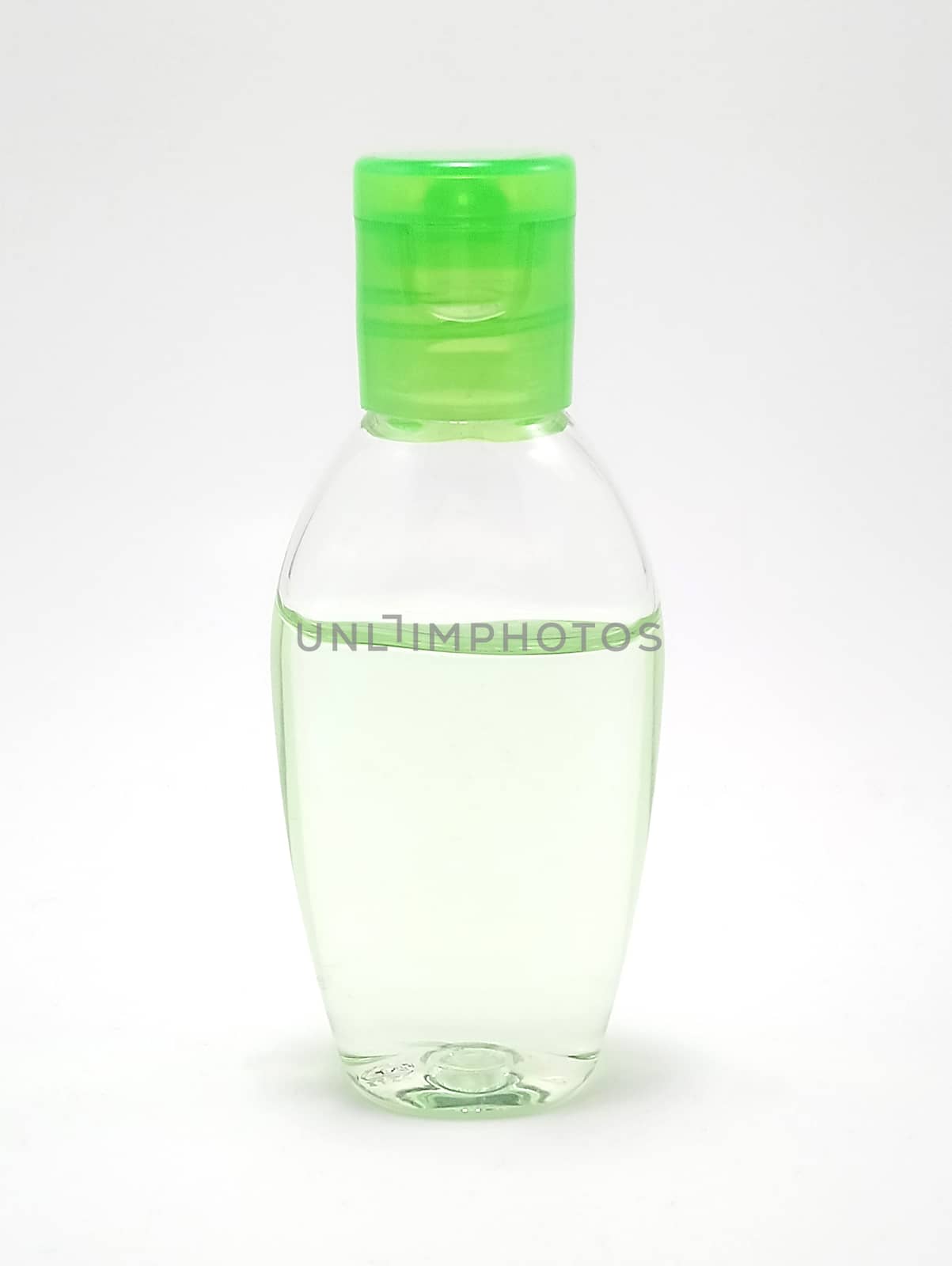 Clear liquid hand sanitizer in plastic bottle use to rub both hands 