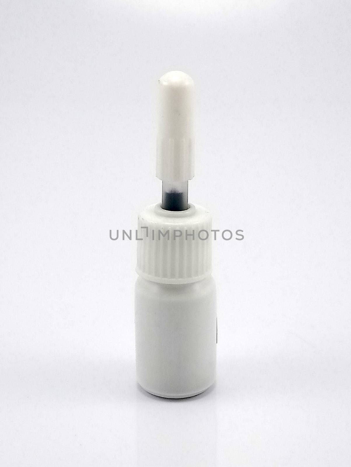 Liquid black refill ink placed in small white plastic bottle by imwaltersy