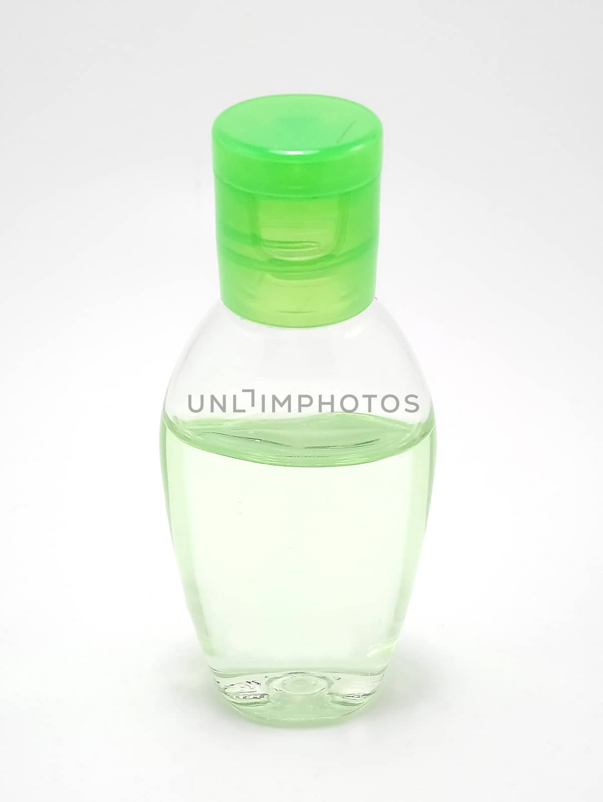Clear liquid hand sanitizer in plastic bottle use to rub both hands 