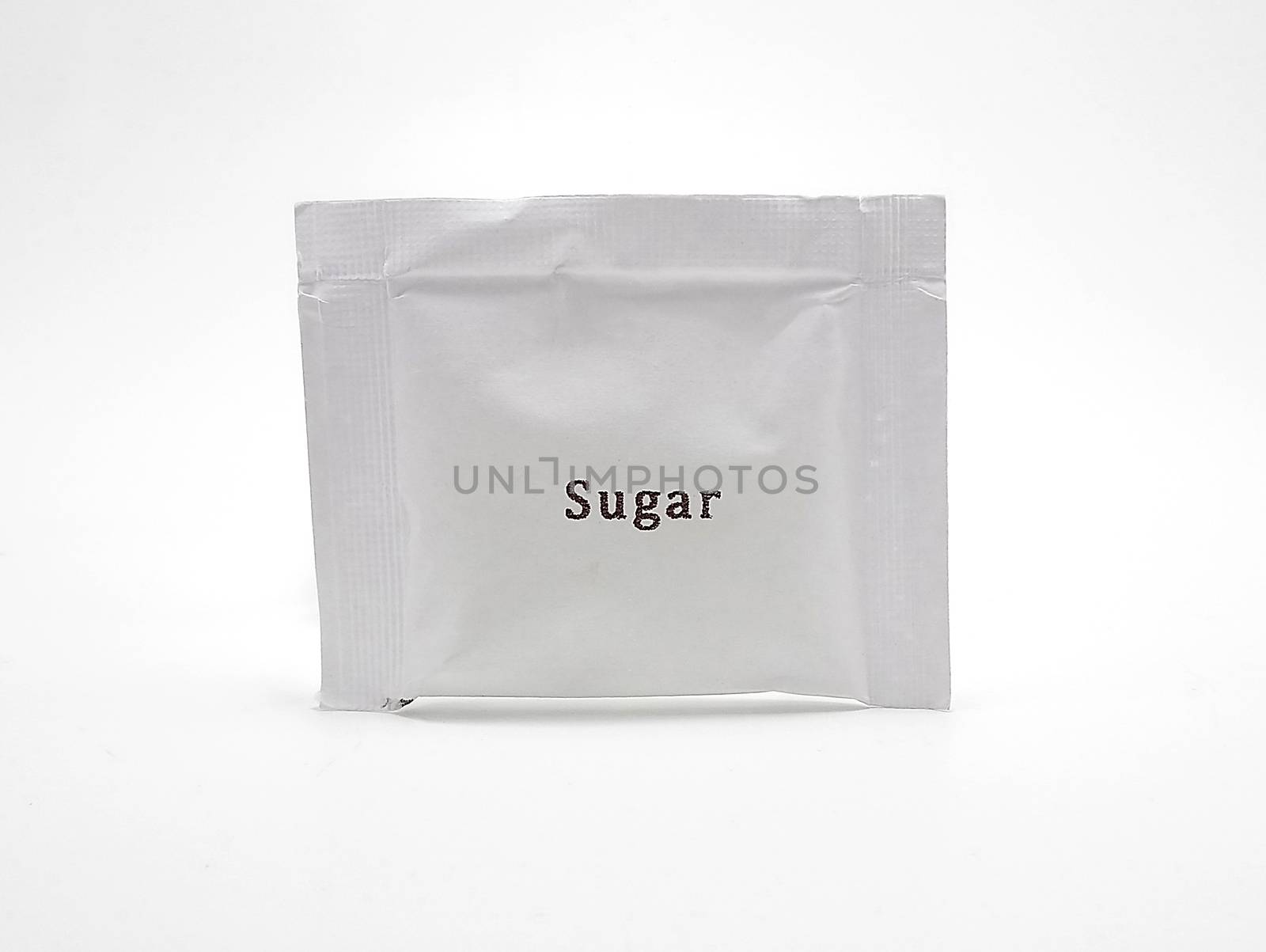 White sachet sugar use to mix on beverages and cooking of foods