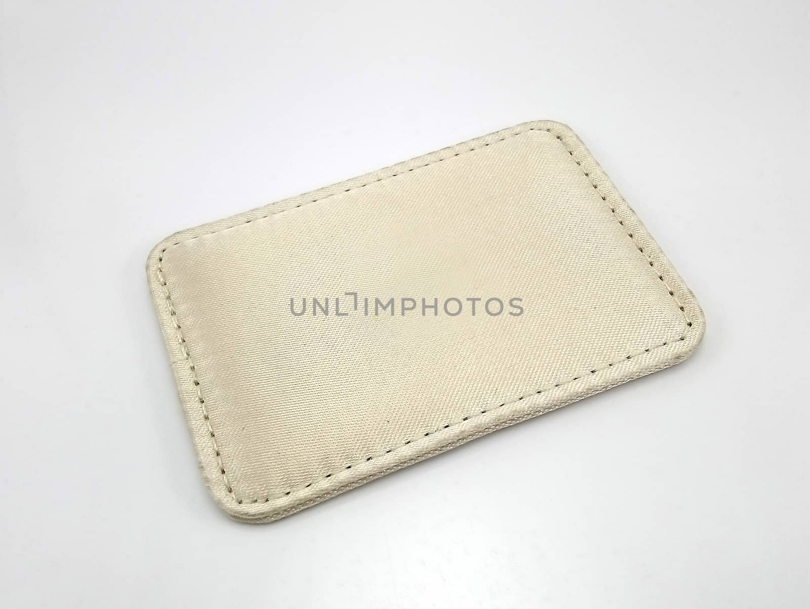 Light brown portable leather mirror case use to see one self reflection for make up
