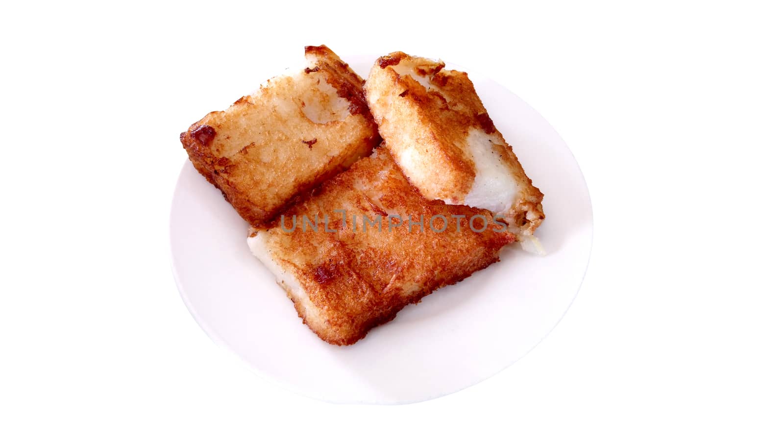 Chinese radish cake on small plate by imwaltersy
