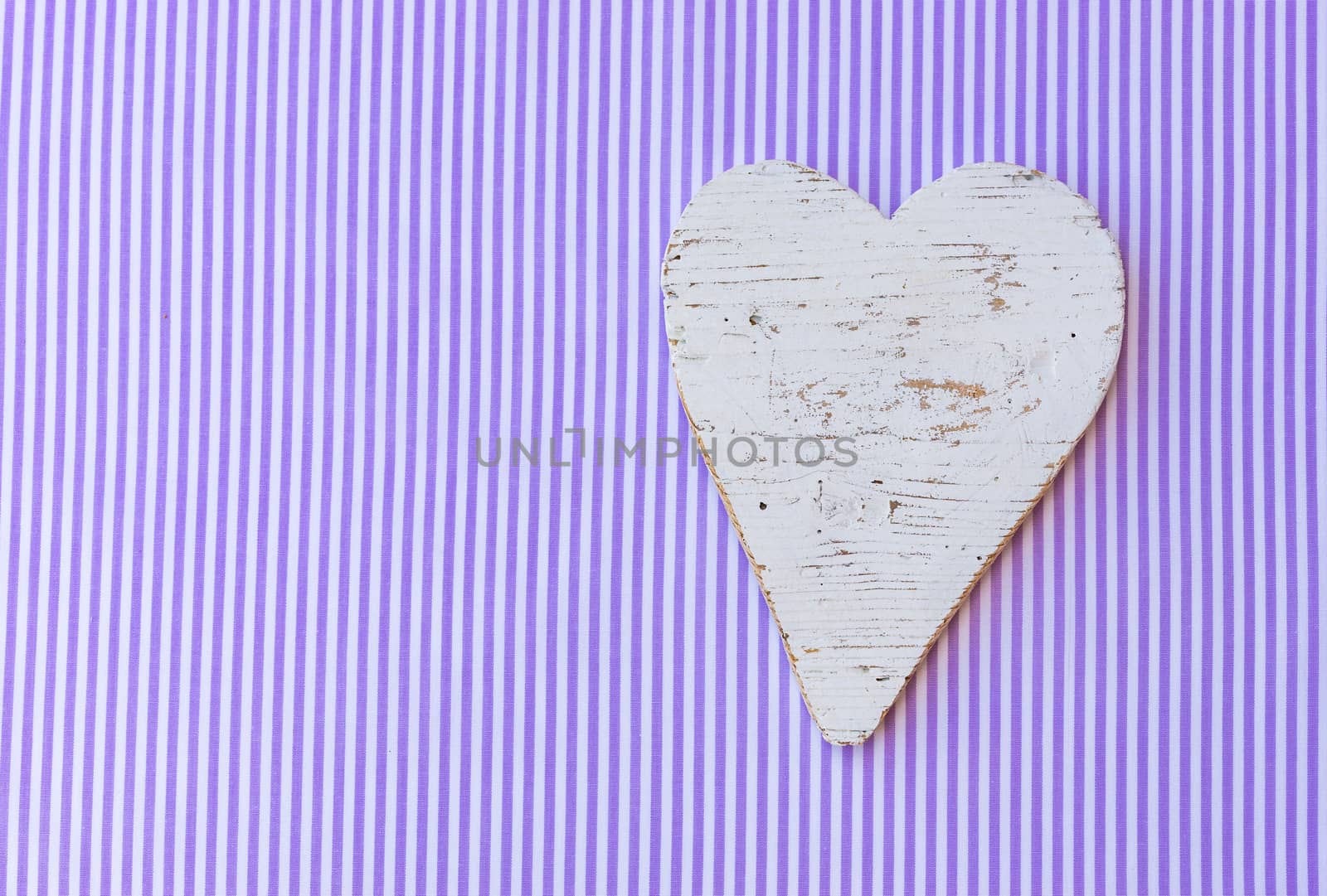 Background for Valentine card with romantic white heart and copy space