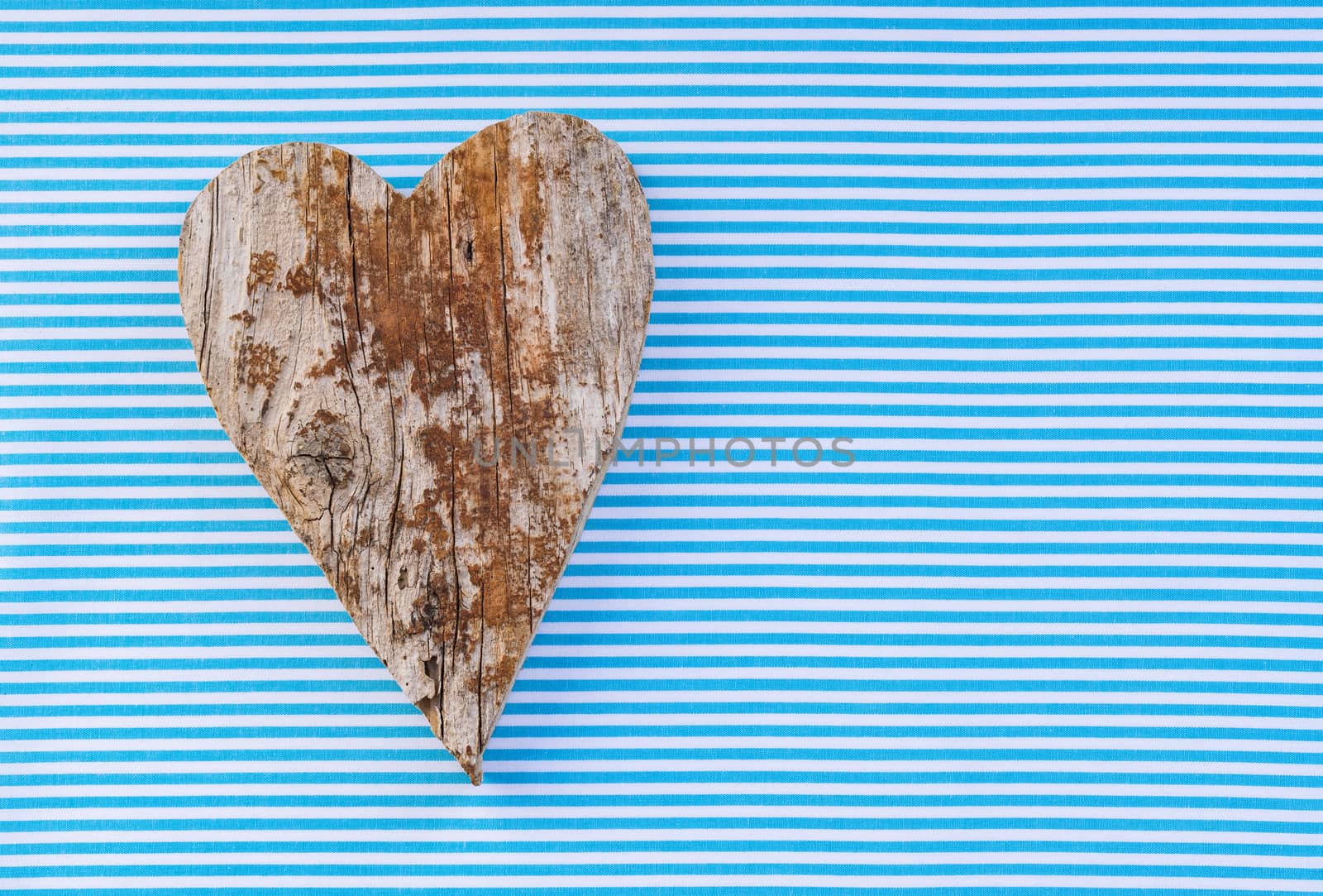 Background for Fathers day with rustic handmade wooden heart shape with copy space
