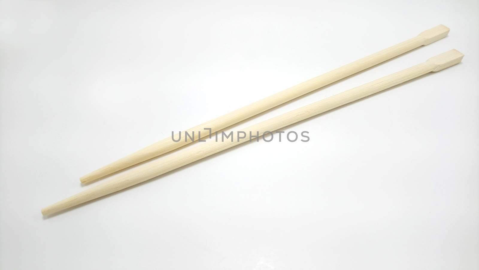 Chinese brown wooden chopsticks use as eating utensil