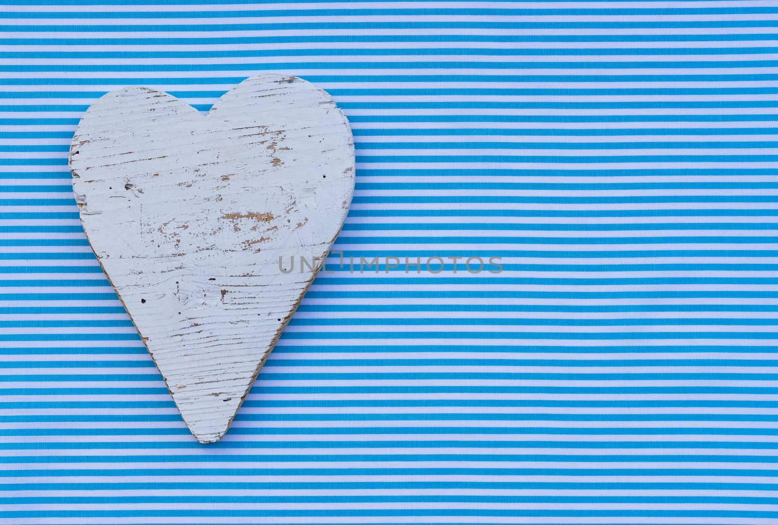 Background for Father's day with white heart and copy space