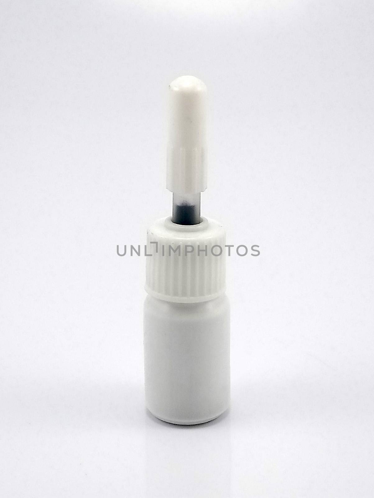 Liquid black refill ink placed in small white plastic bottle by imwaltersy