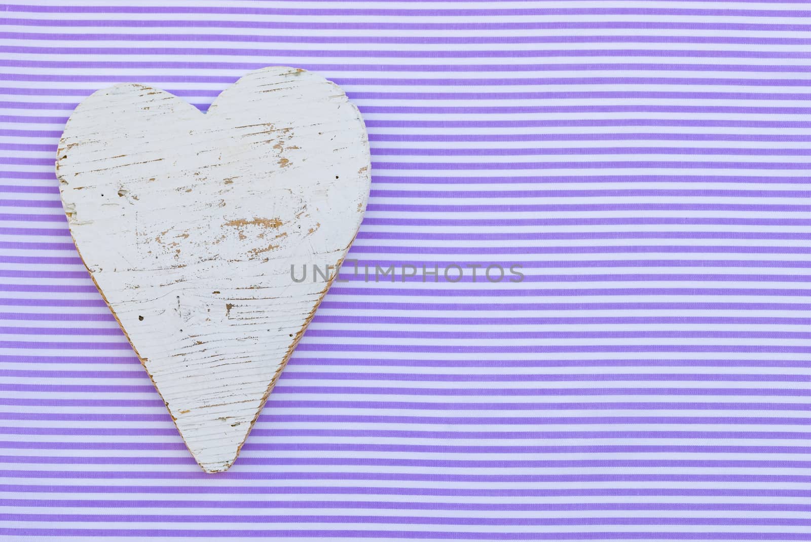 Valentine's day background with romantic white wooden heart and copy space