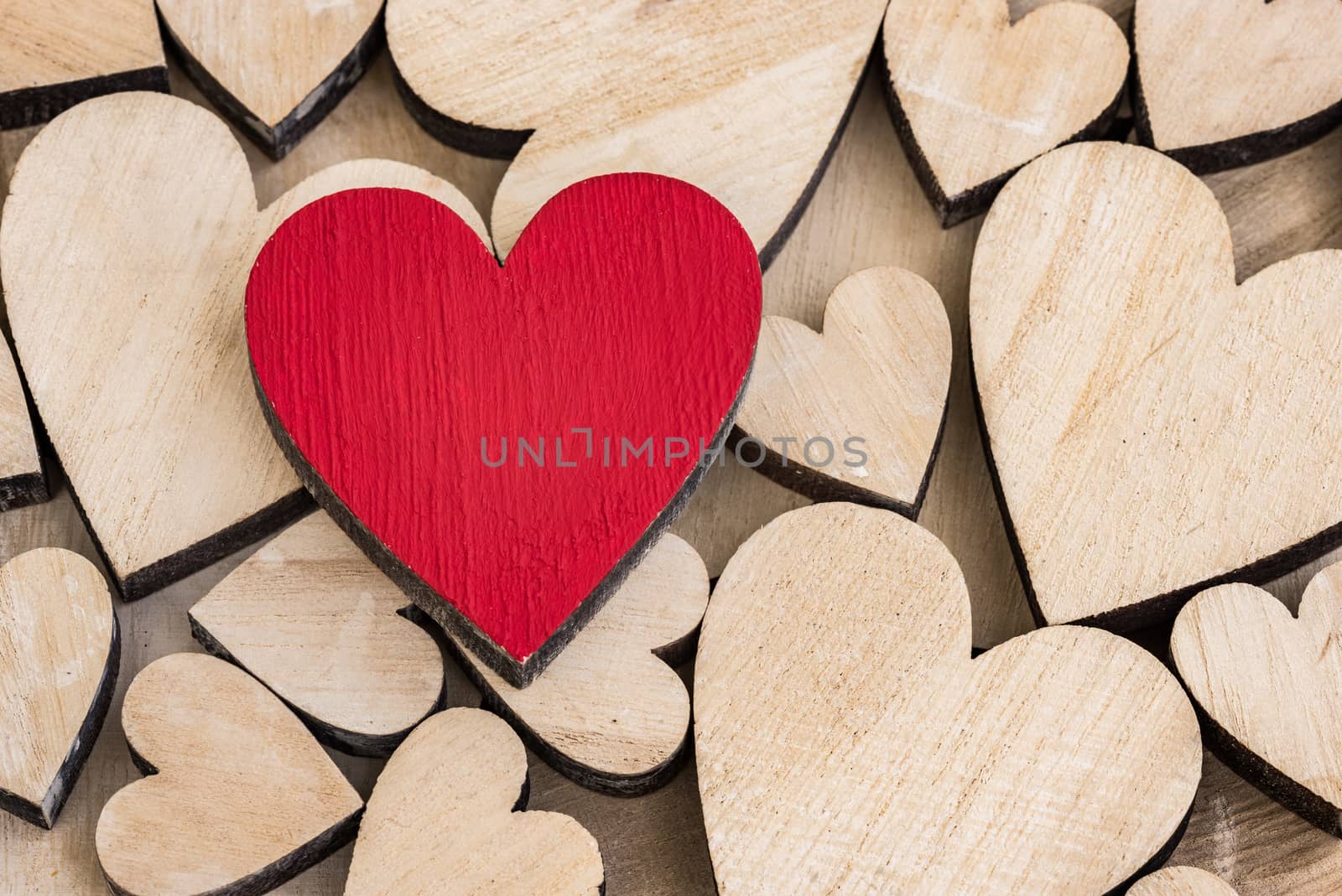 Romantic Valentines day background with wooden love hearts