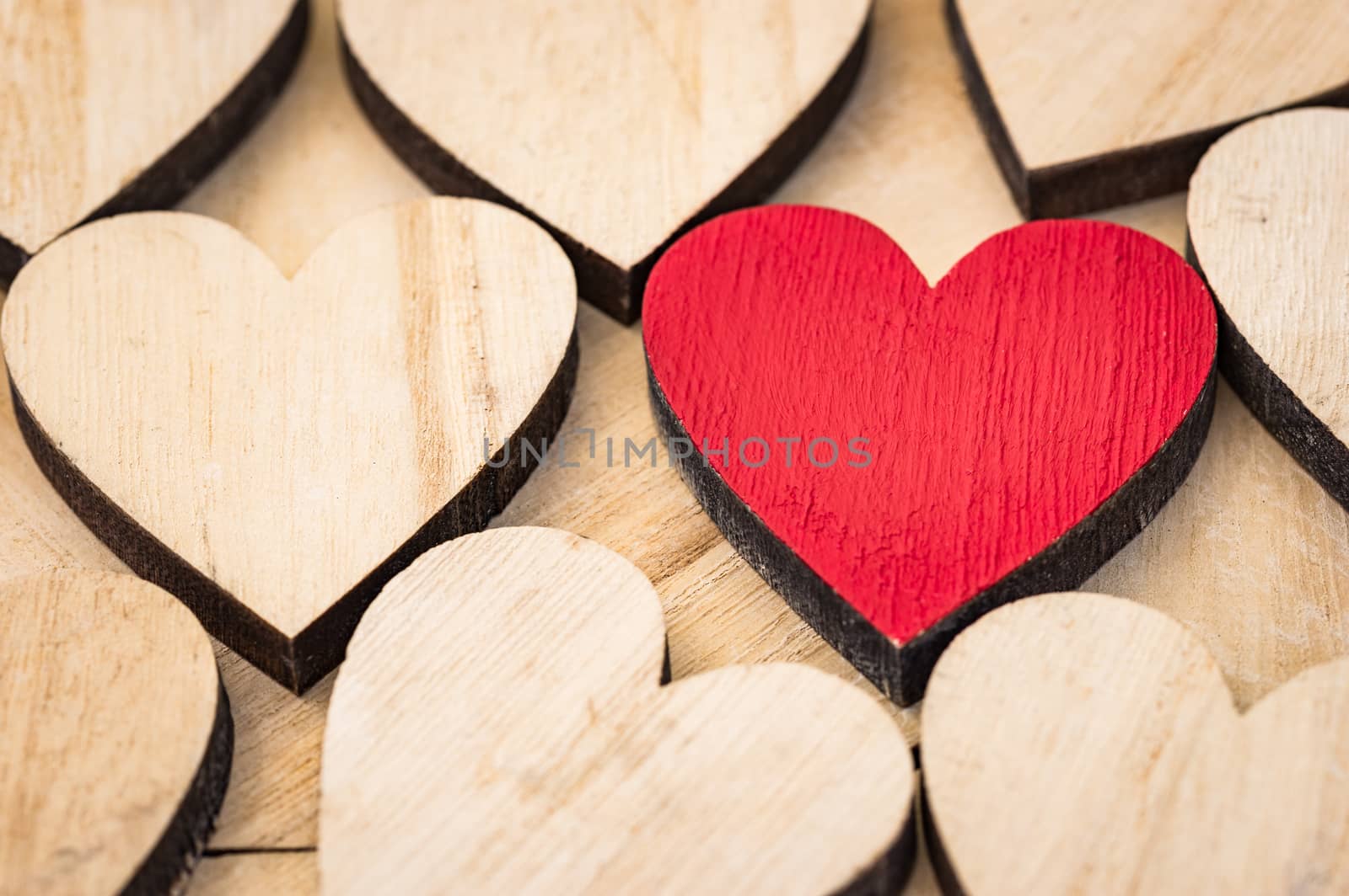 Valentine day background with wooden love hearts 