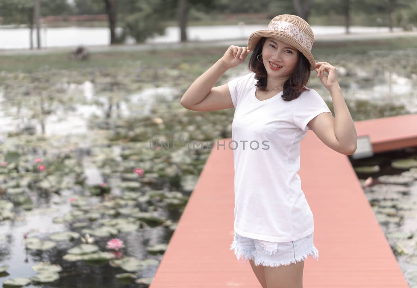 Woman happy feeling with green nature background