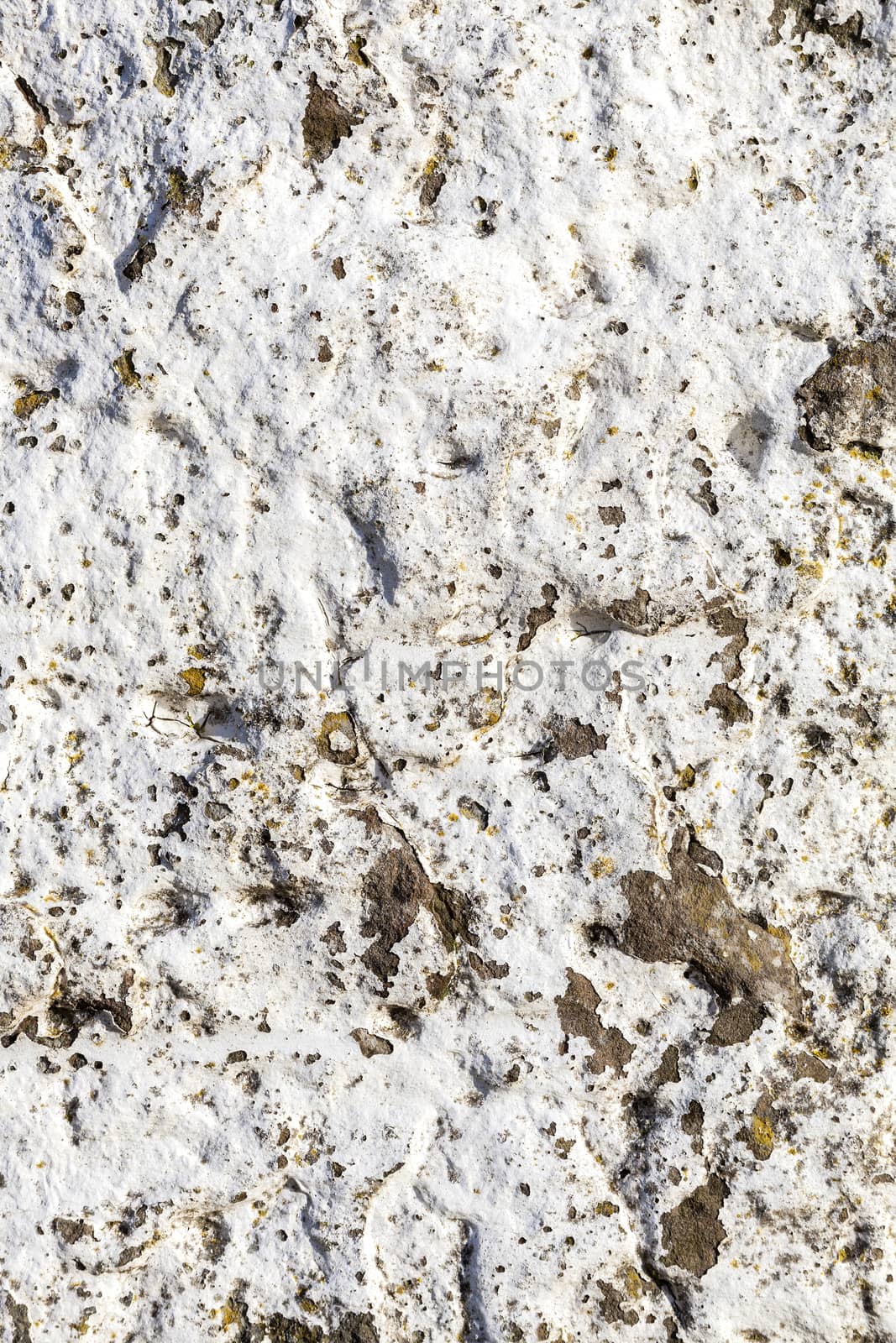Old white cracked cement concrete wall distressed texture grunge background