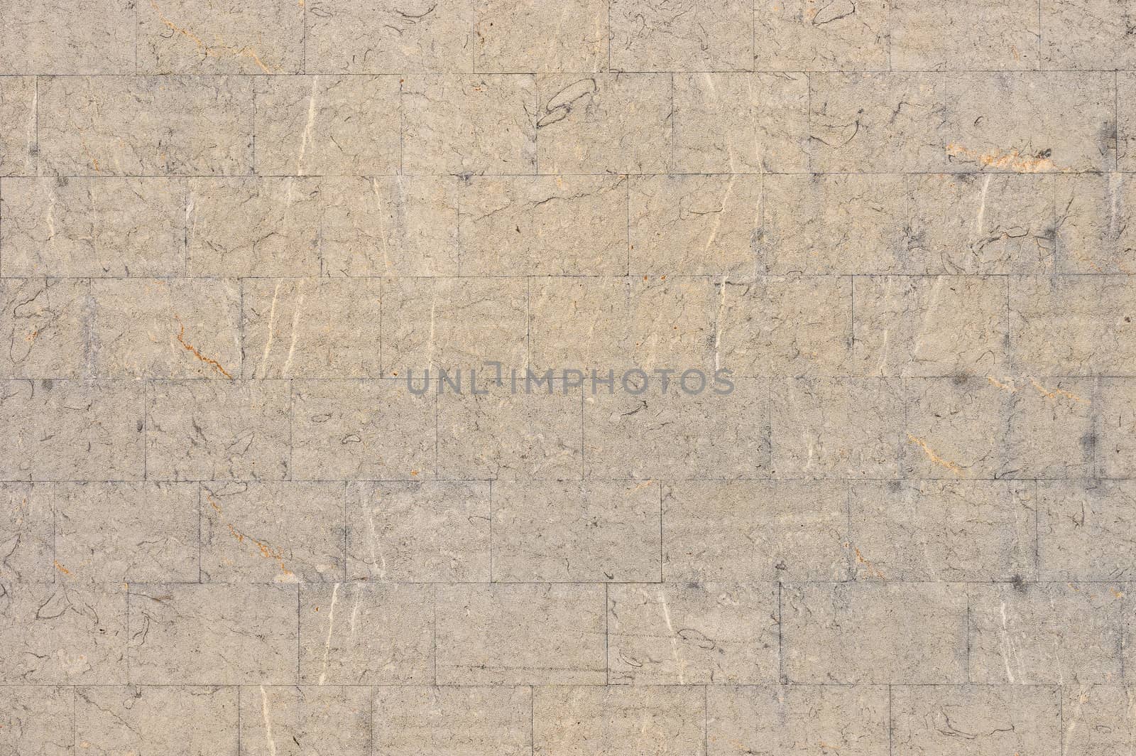 Old gray brick stone wall background texture