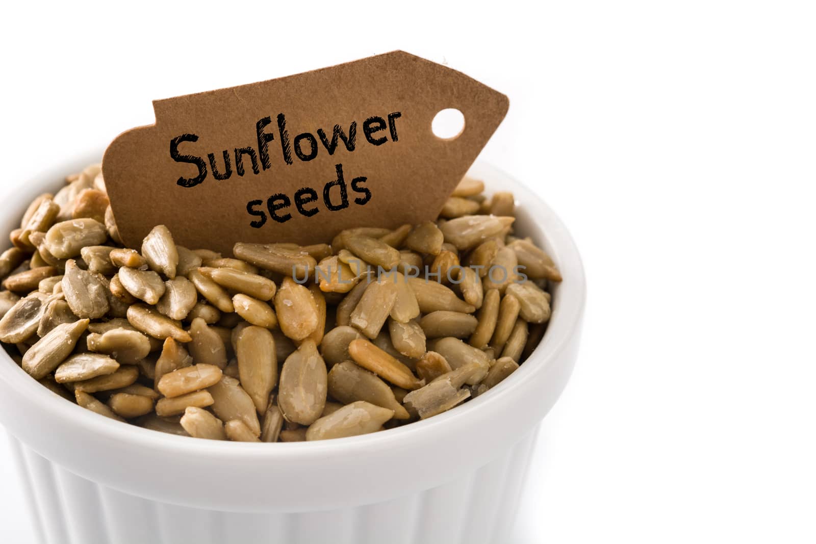 Sunflower seeds in bowl  by chandlervid85