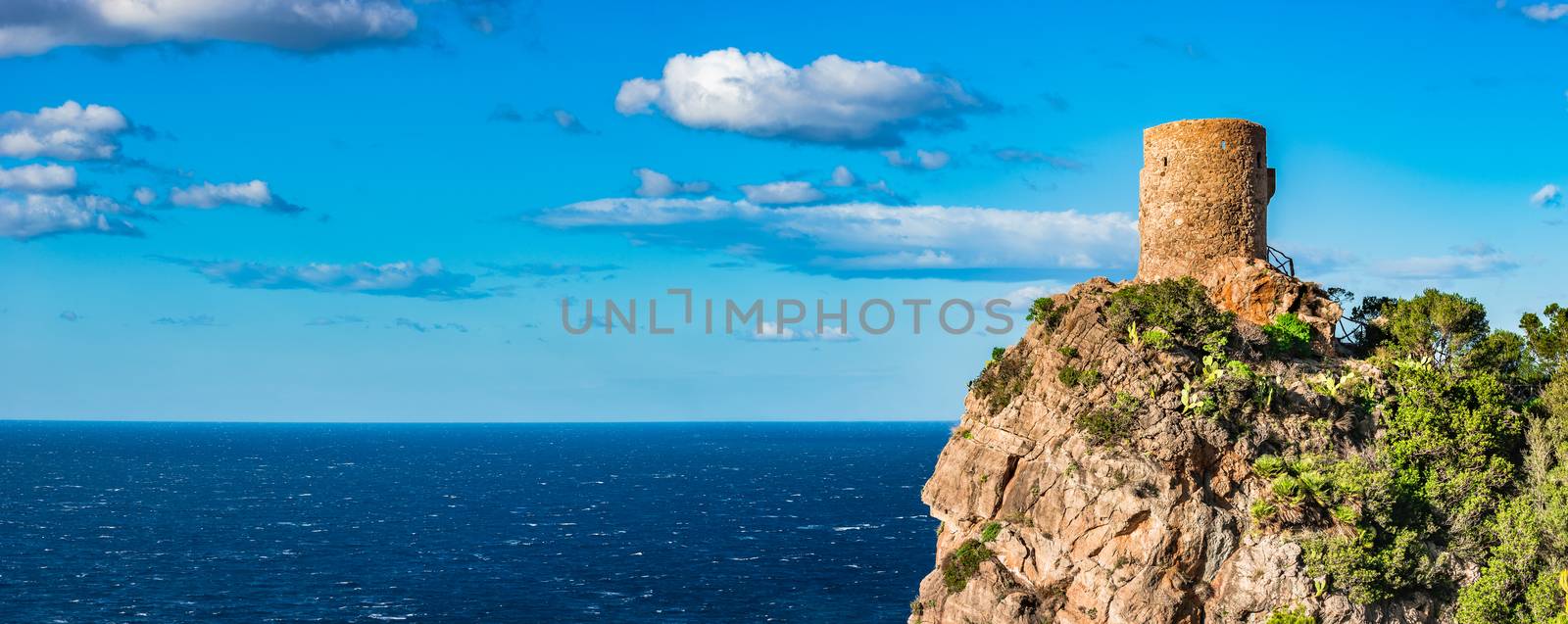 Panoramic view of ancient fort watch tower at the coast of Mallorca island, Spain