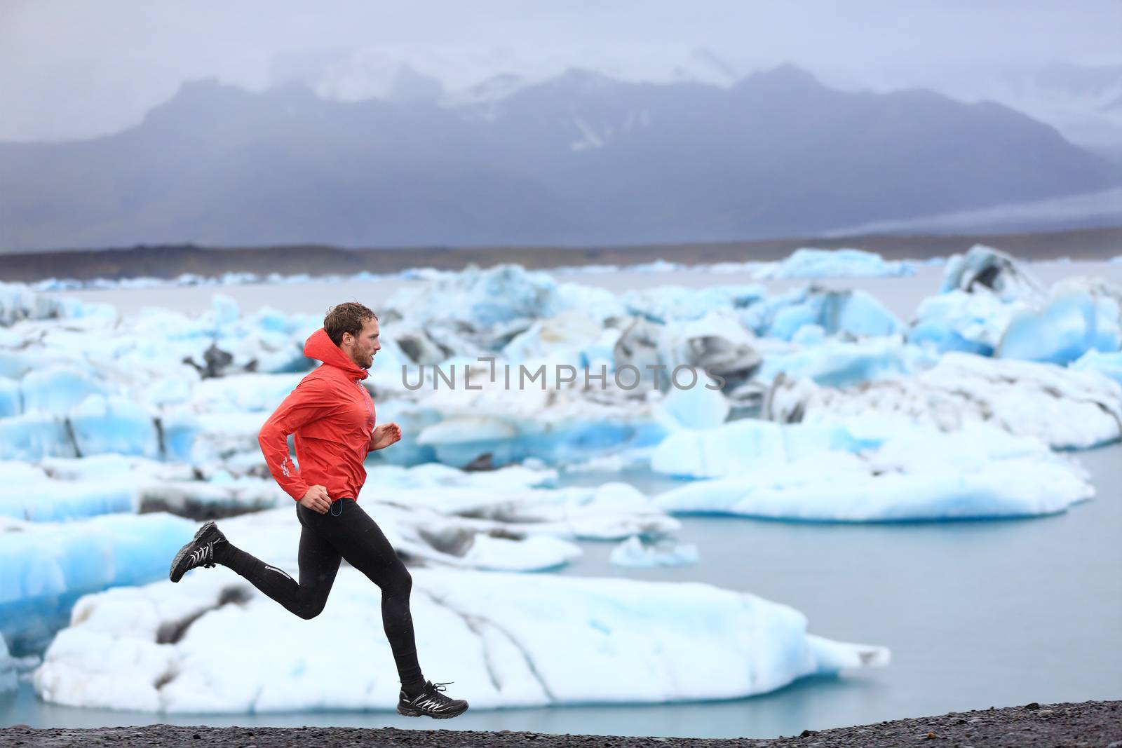 Running man sprinting trail runner in fast sprint by Maridav