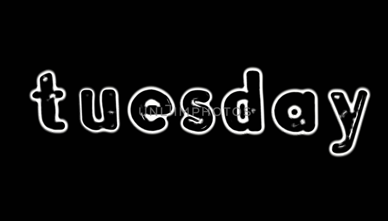 Plastic letters with the word Tuesday converted to black and white illustration