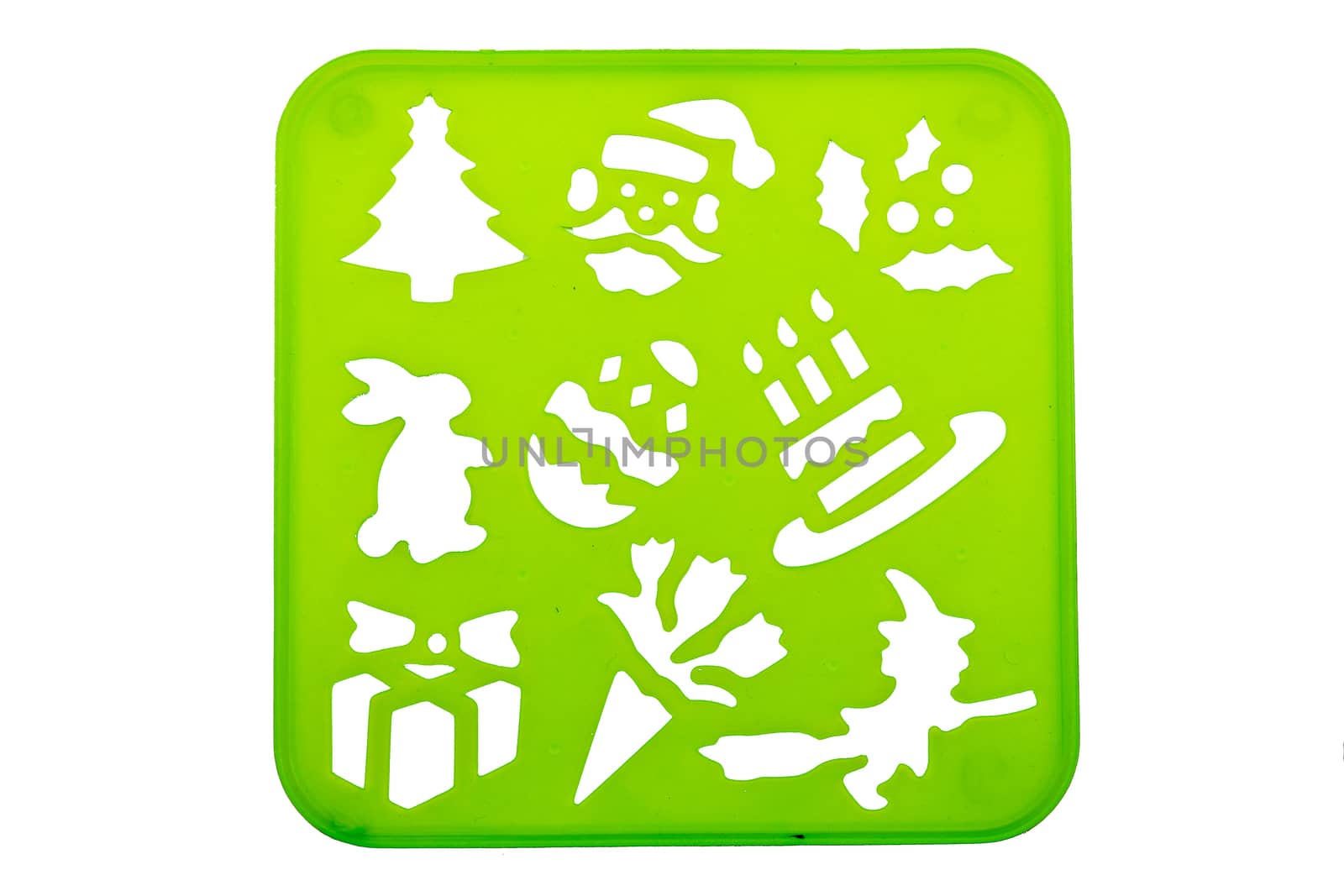 Holiday stencil shapes on a green background