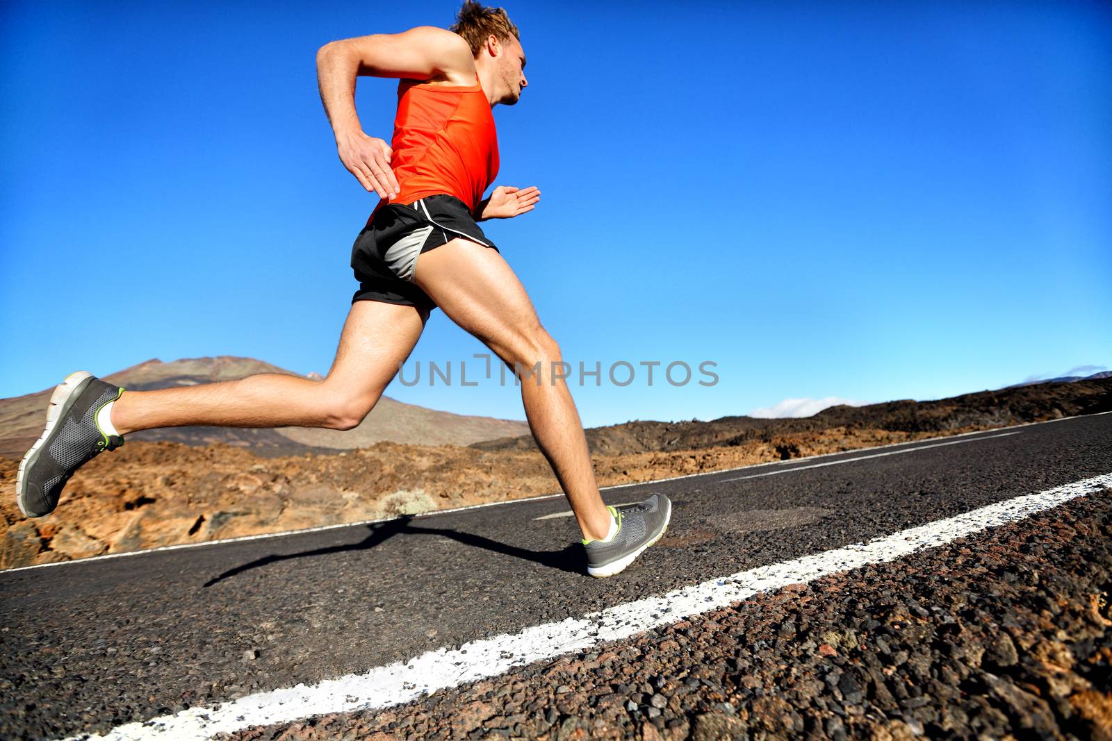 Runner man running sprinting for success on run by Maridav