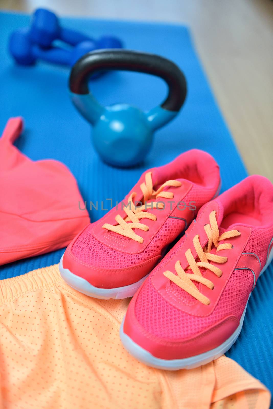 Gym shoes - Fitness outfit closeup with kettlebell by Maridav