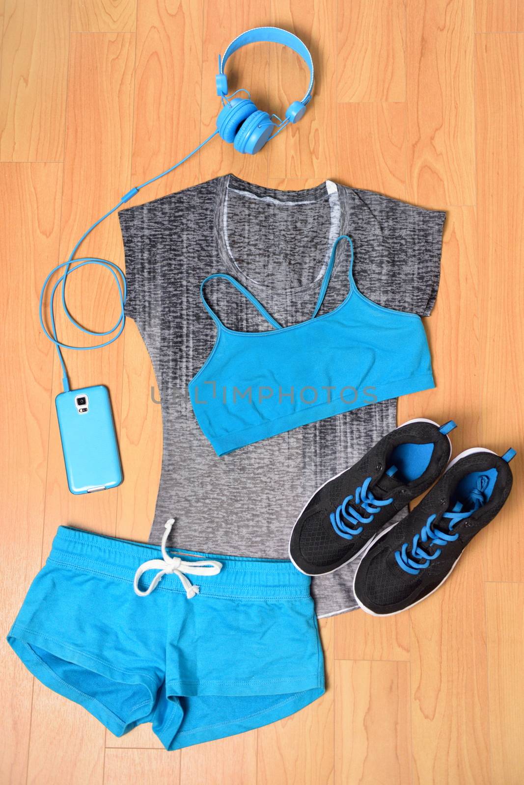 Gym outfit - workout clothing and smartphone by Maridav