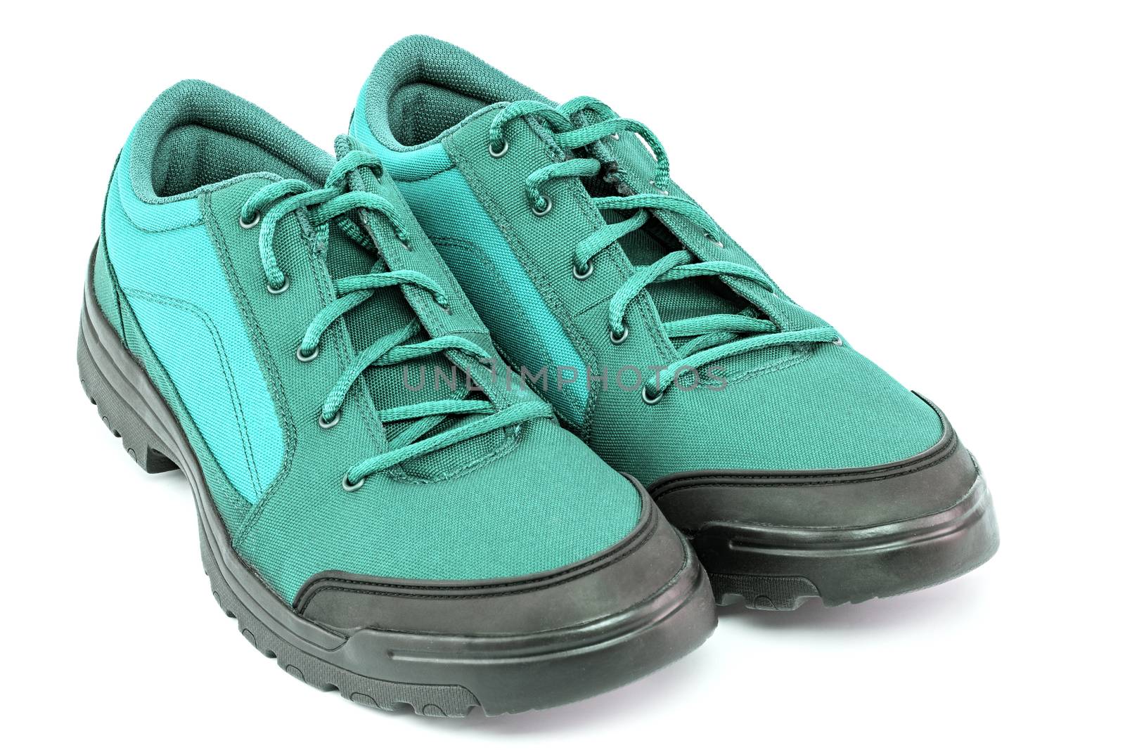 a pair of cheap aqua mint turquoise green hiking shoes isolated on white background - perspective close-up view by z1b