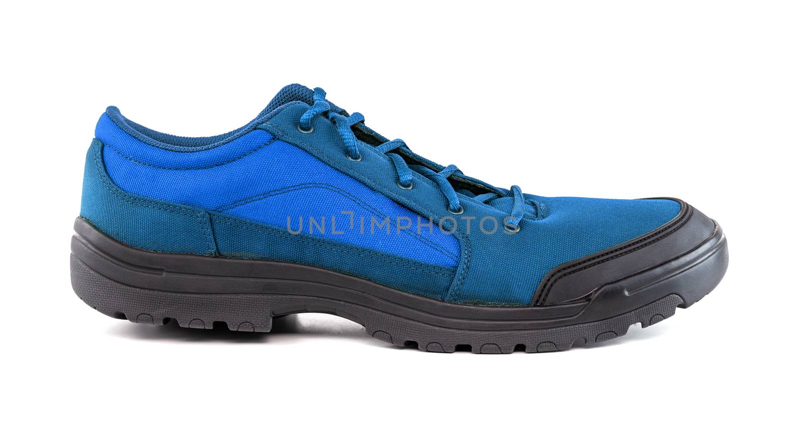 right cheap light blue hiking or hunting shoe isolated on white background, side view.