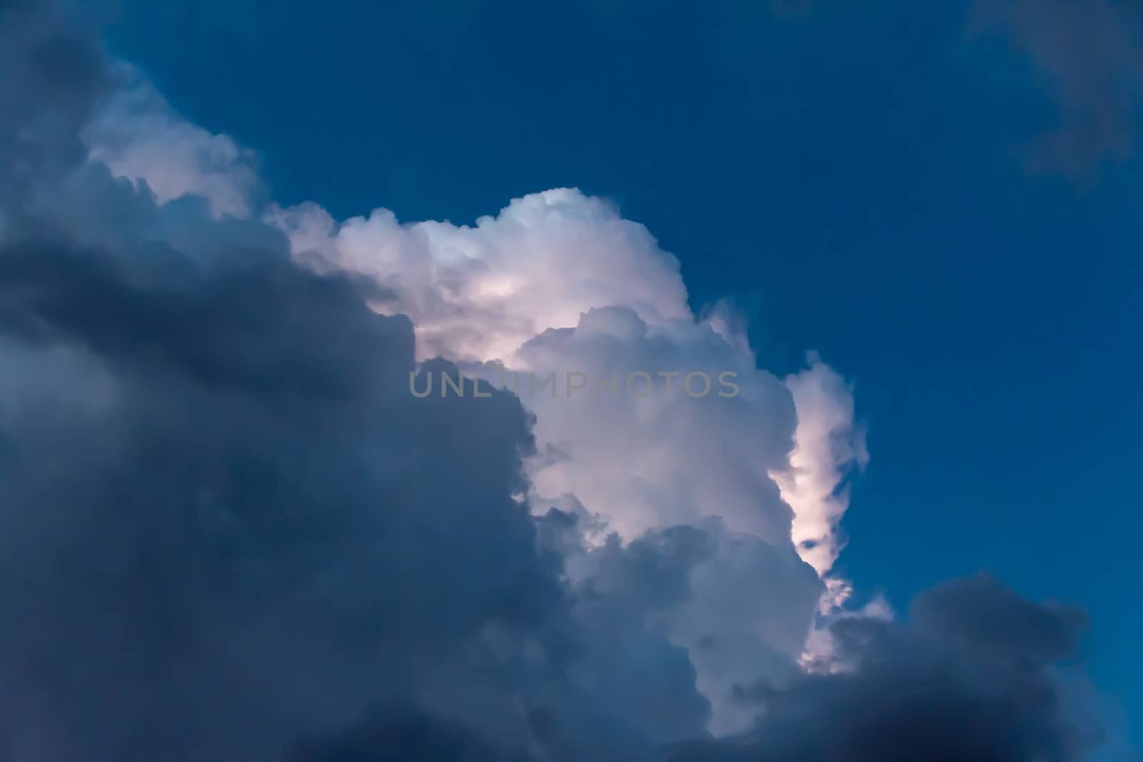 Thunder Storm clouds backlit from lightning