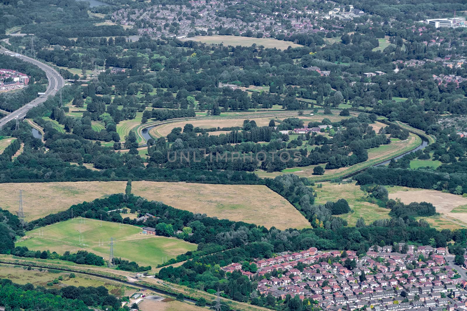 Aerial shot from a plane window of the english countryside