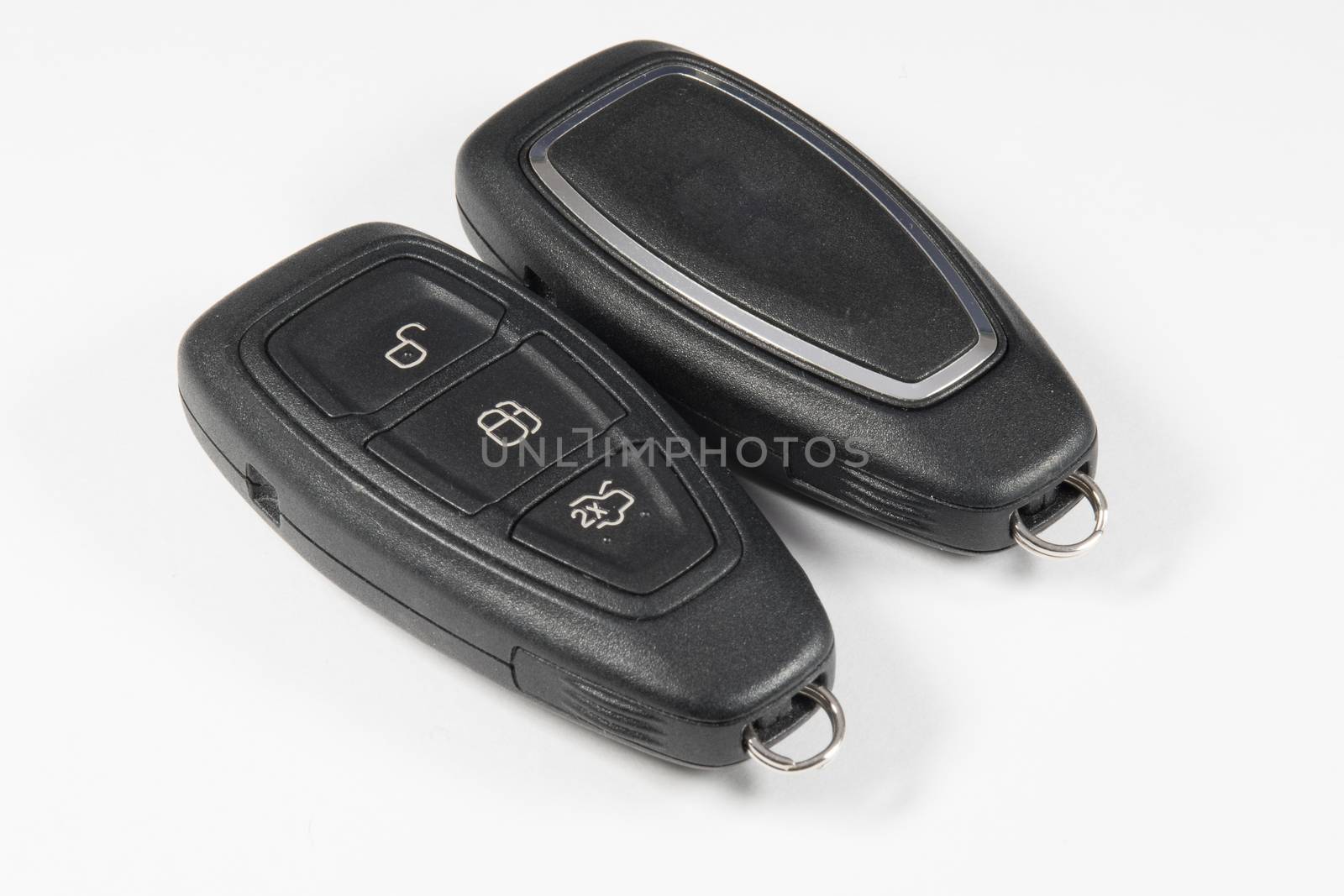 Keyless car key fob showing front and back