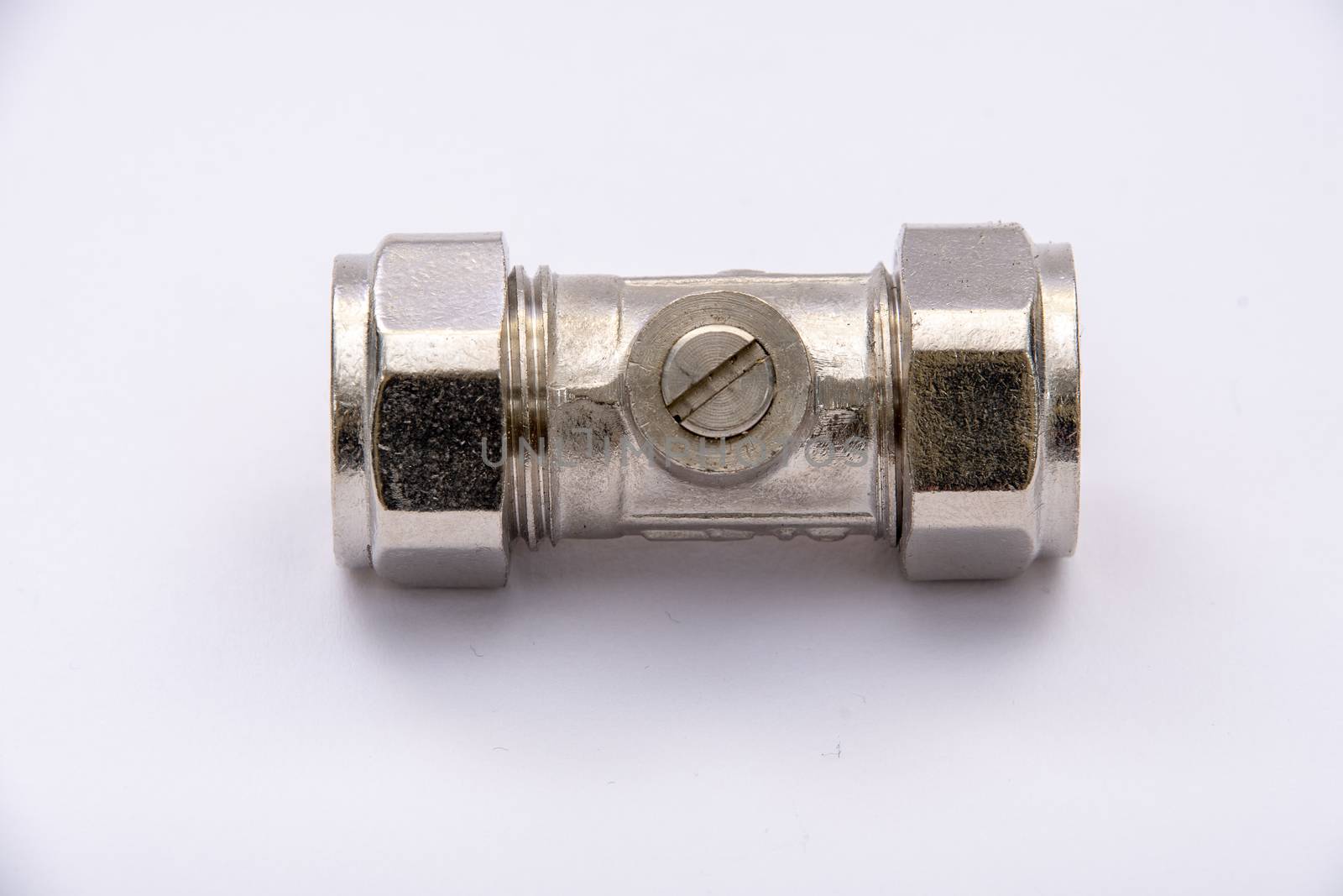 15mm metal plumbing pipe isolation valve on a white background