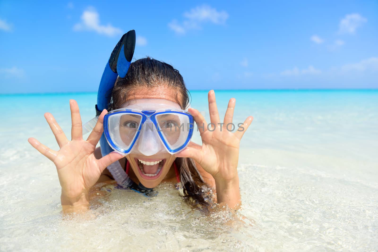 Beach vacation fun woman in snorkel mask by Maridav