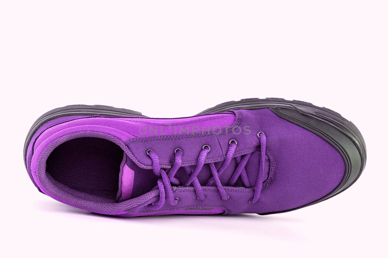 right cheap purple hiking or hunting shoe isolated on white background - view from above by z1b