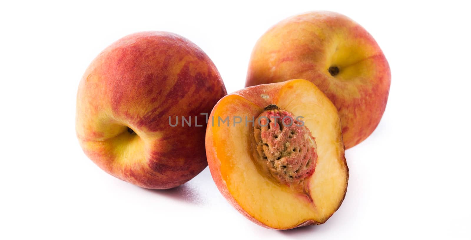 Fresh peach isolated on white background by chandlervid85