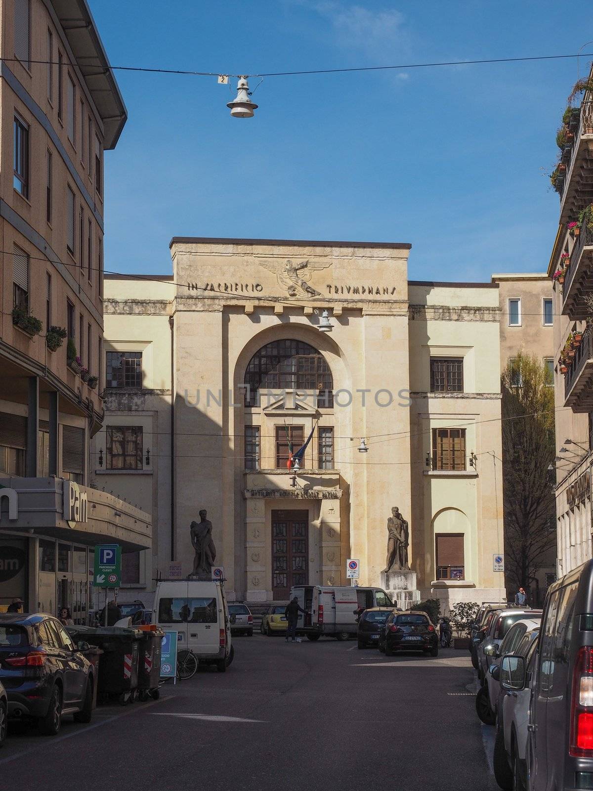VERONA, ITALY - CIRCA MARCH 2019: Palazzo dei Mutilati (House of the Mutilated). In sacrificio triumphans means Triumphant in sacrifice