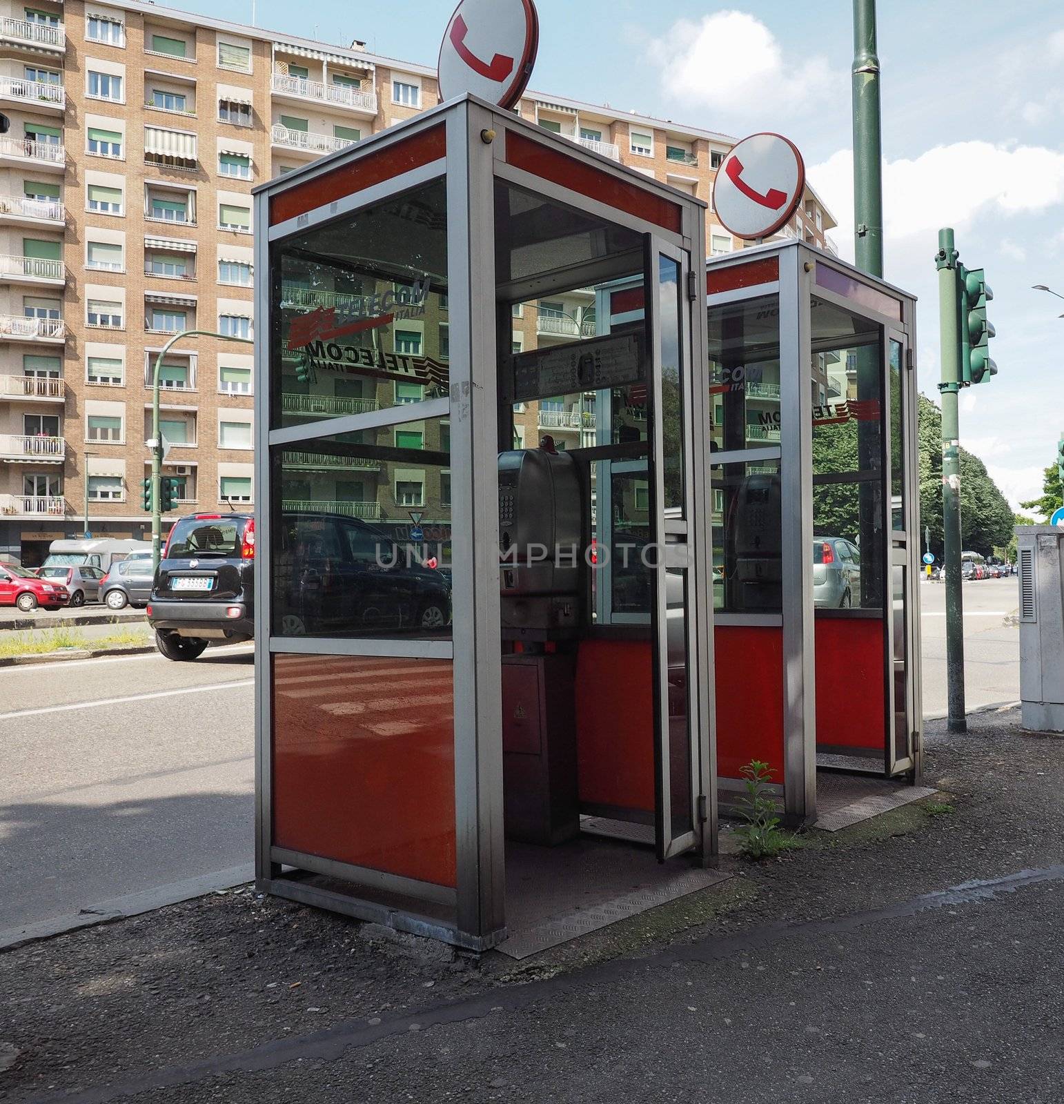TURIN, ITALY - CIRCA MAY 2019: Vintage Telecom red phone boxes
