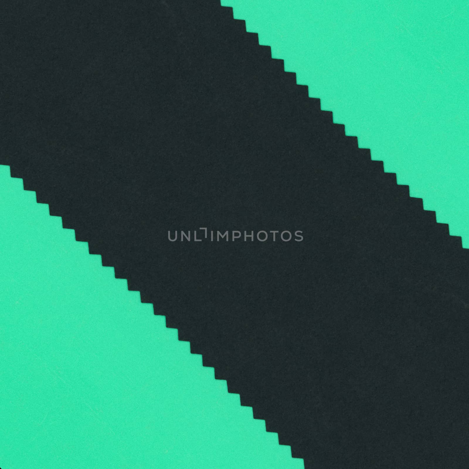green and black cardboard texture background by claudiodivizia