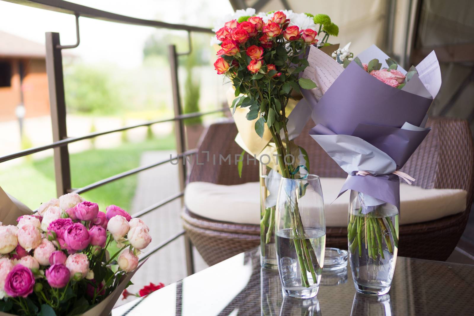 Blurred background - bouquets of rose flower - green outdoors background