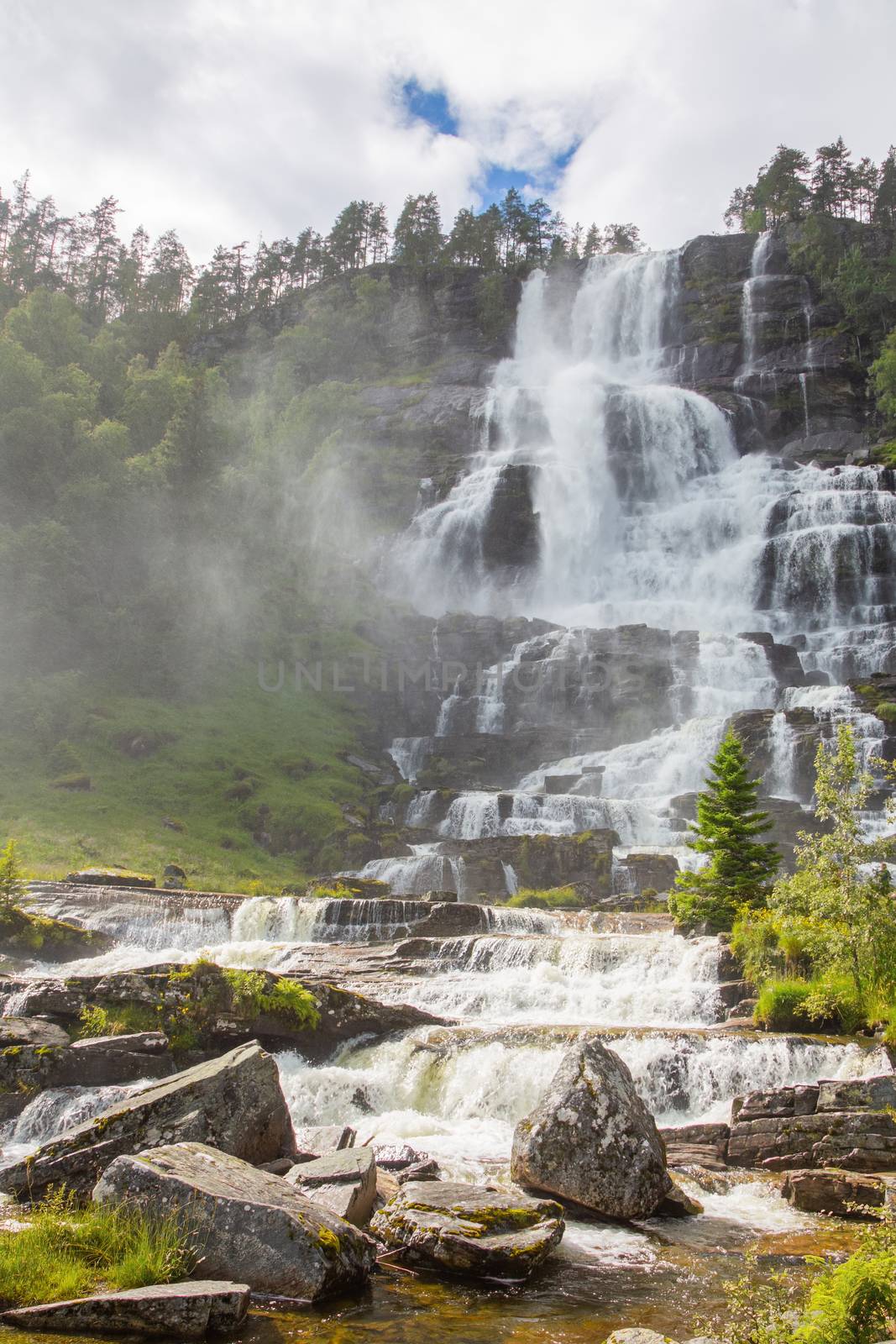 Falls in mountains of Norway in rainy weather by Sid10