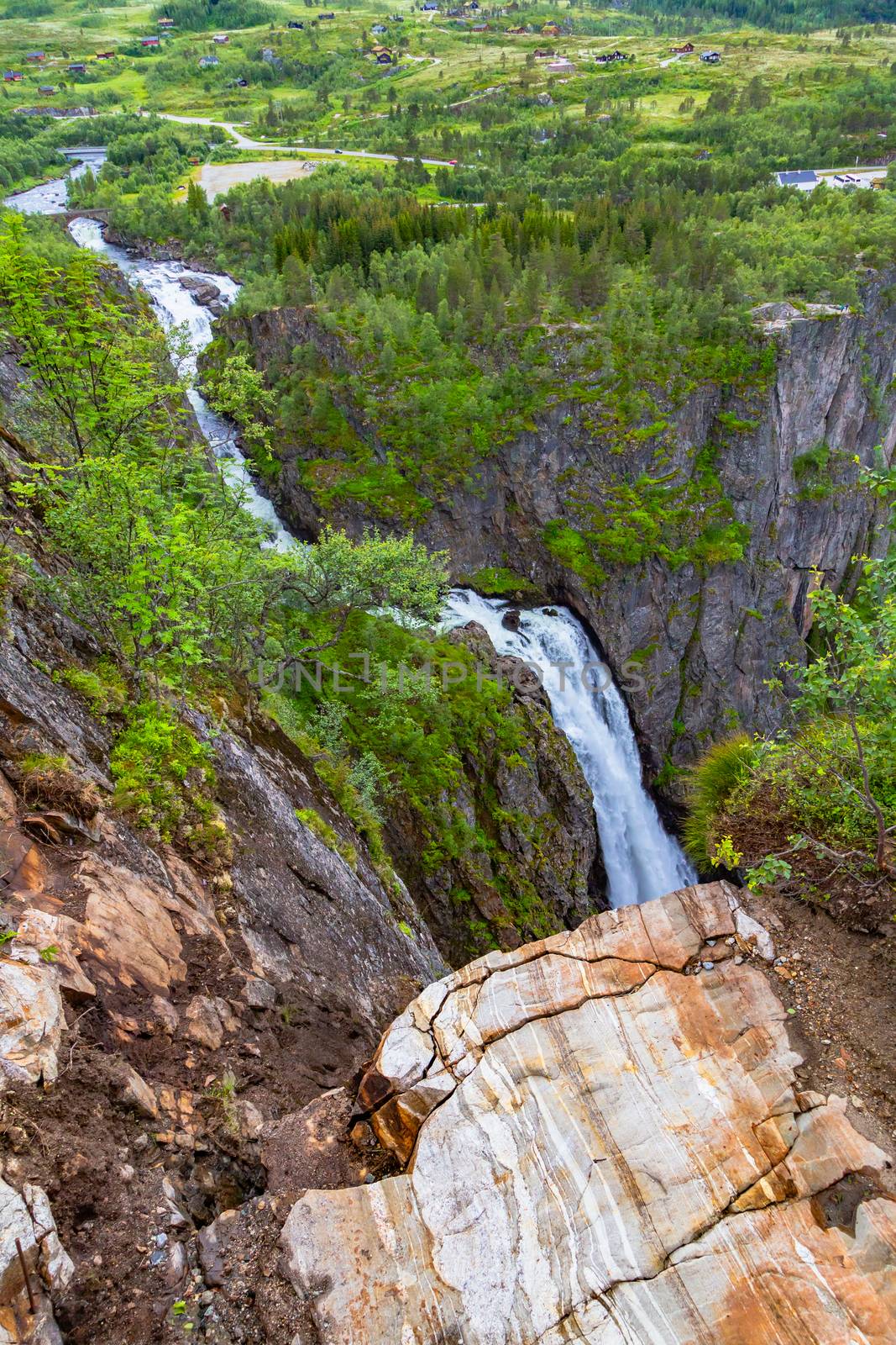 Falls in mountains of Norway. Waterfall Voringfossen - the fourth highest peak in Norway. Voringsfossen Waterfall. Beautiful view of the Voringsfossen waterfall. Bjoreio river. Norway.