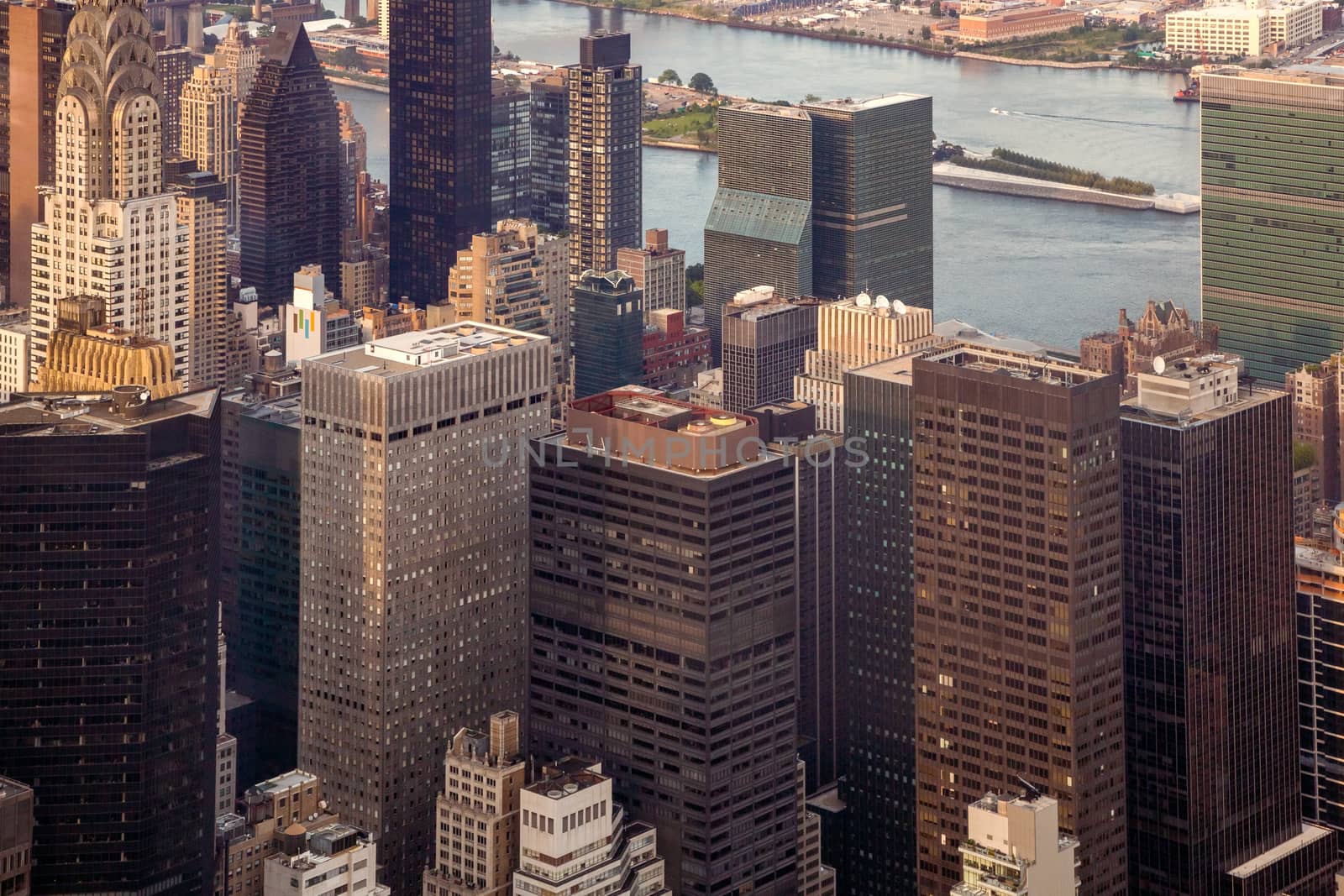 New York City Manhattan street aerial view with skyscrapers. Skyscrapers New York. Skyscrapers aerial. Skyscrapers in New York at sunset.