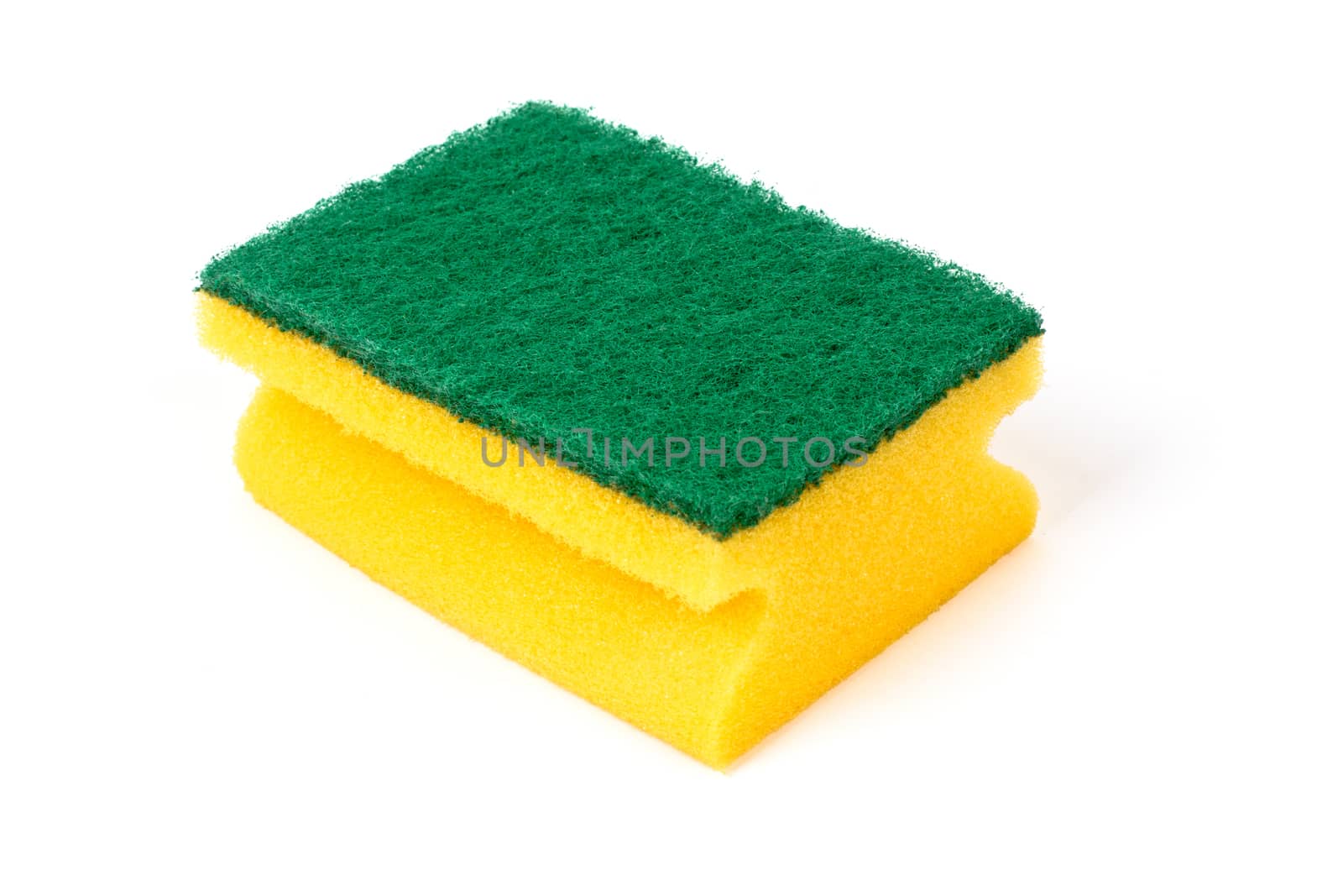 A kitchen sponge isolated against white background