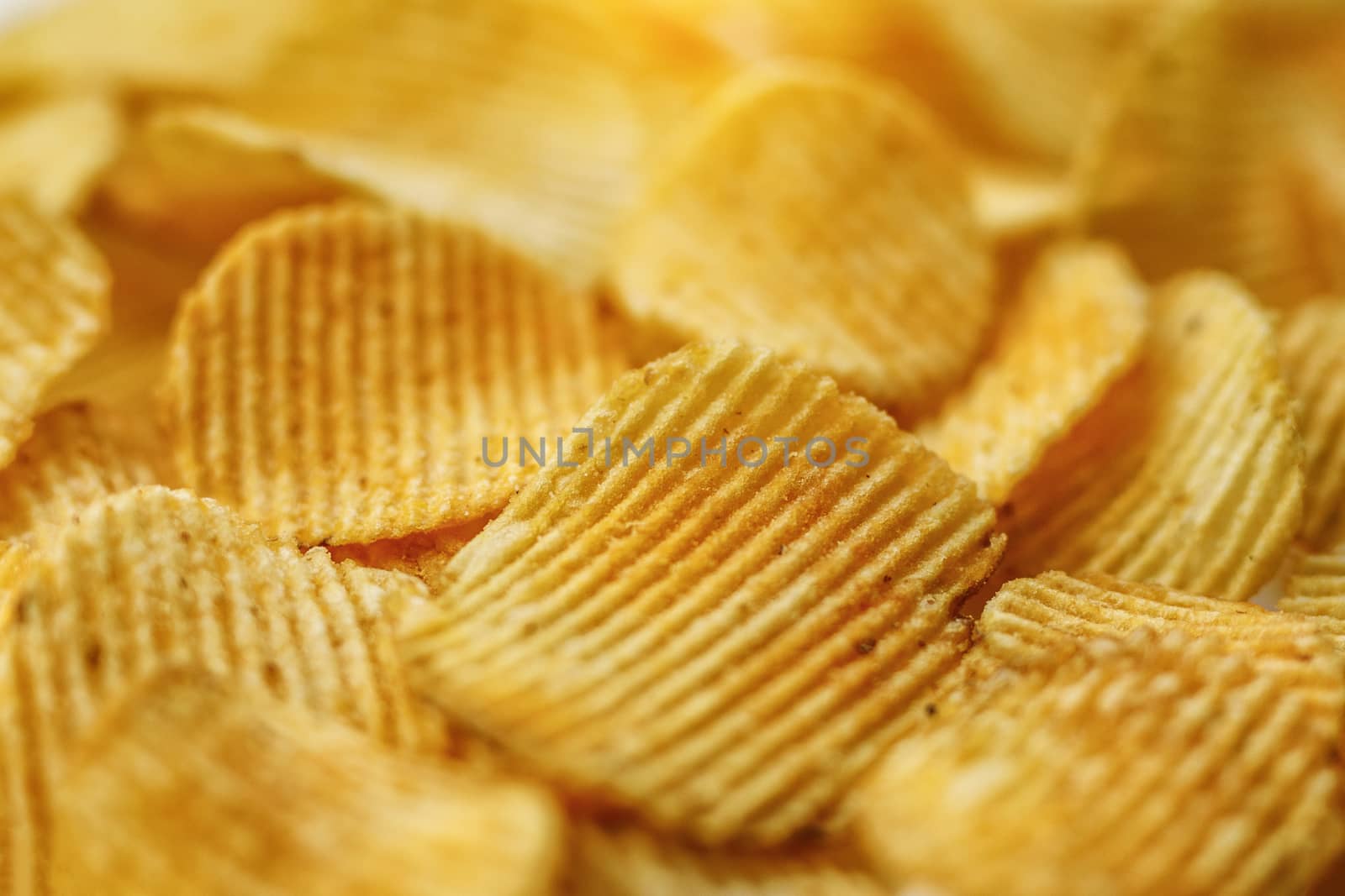 Corrugated Potato Chips. Food background. Top view. by 9parusnikov