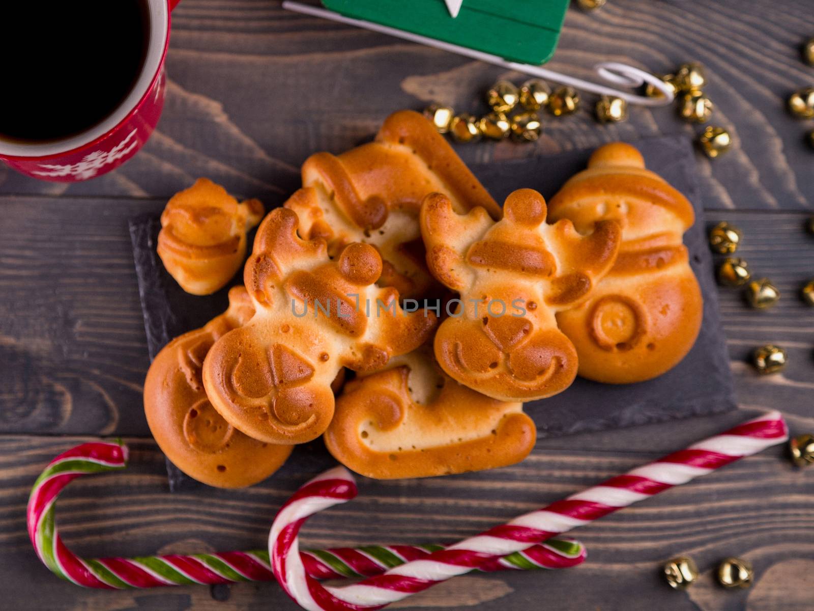 Christmas cookies homemade on wooden background. by Sid10