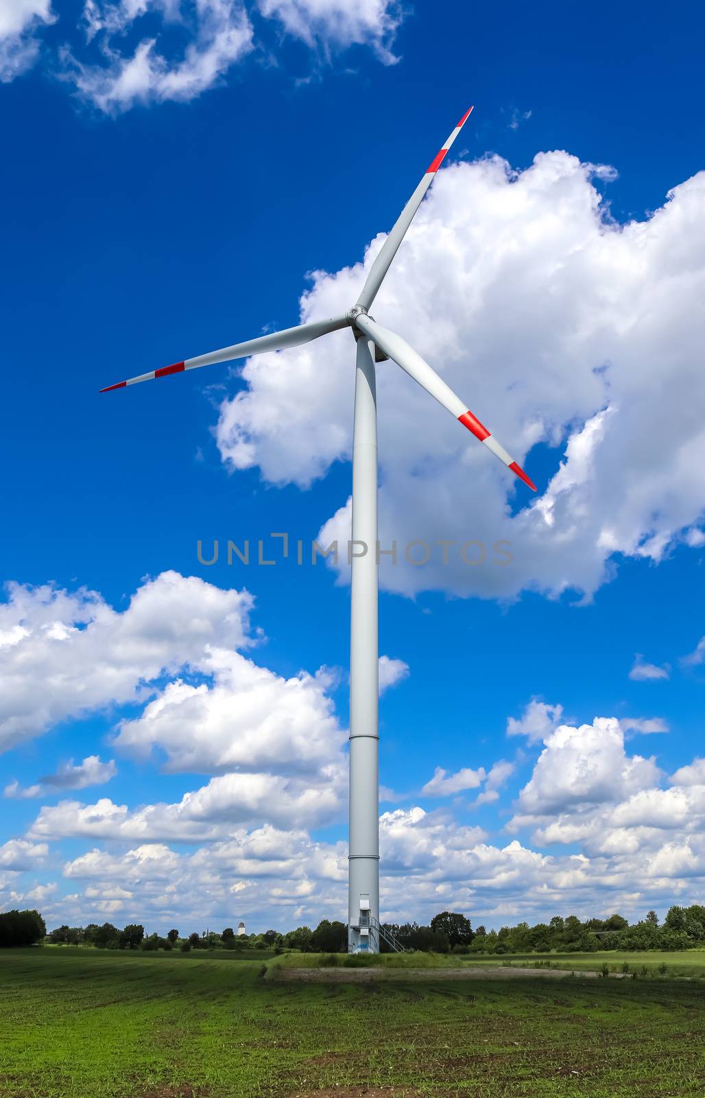 Panoramic view on alternative energy wind mills in a windpark