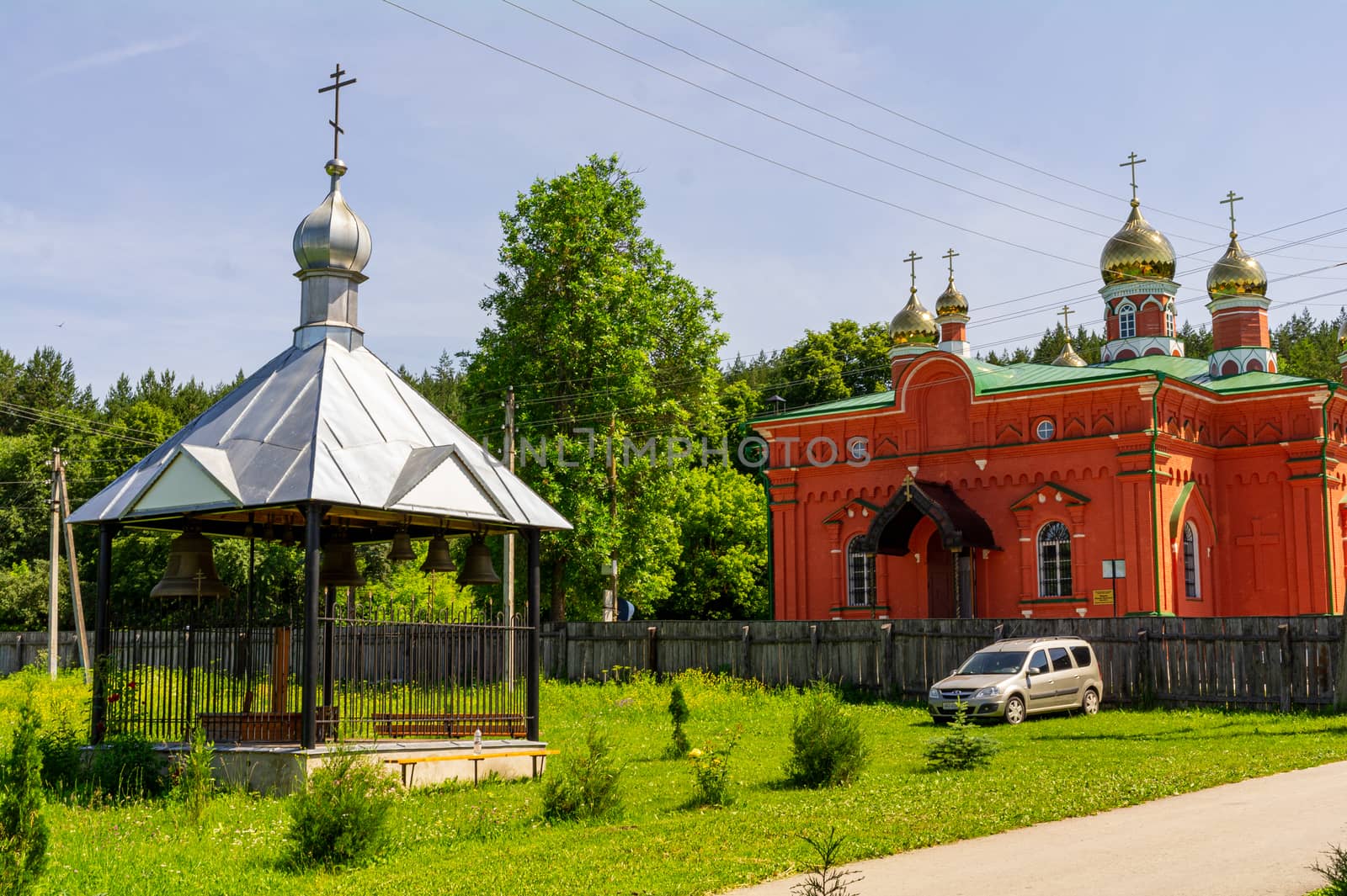 The belfry and the Makaryevskaya church on the territory of the Holy Vvedensky Makaryevsky Zhabyn Monastery, summer