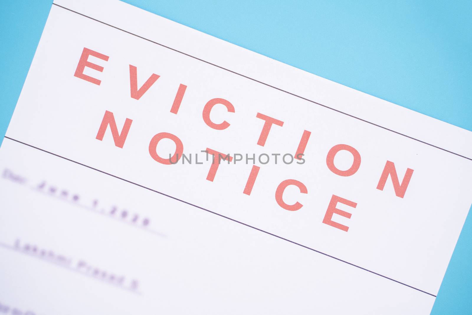 Close up of Foreclosed or eviction notice with blurred details at hose