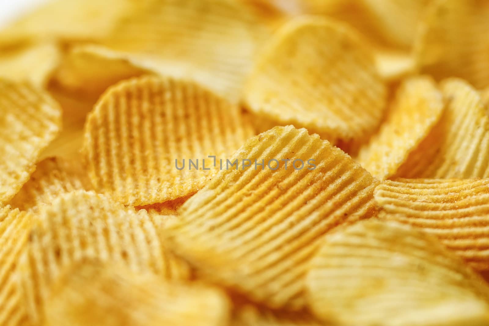 Corrugated Potato Chips. Close-up macro view