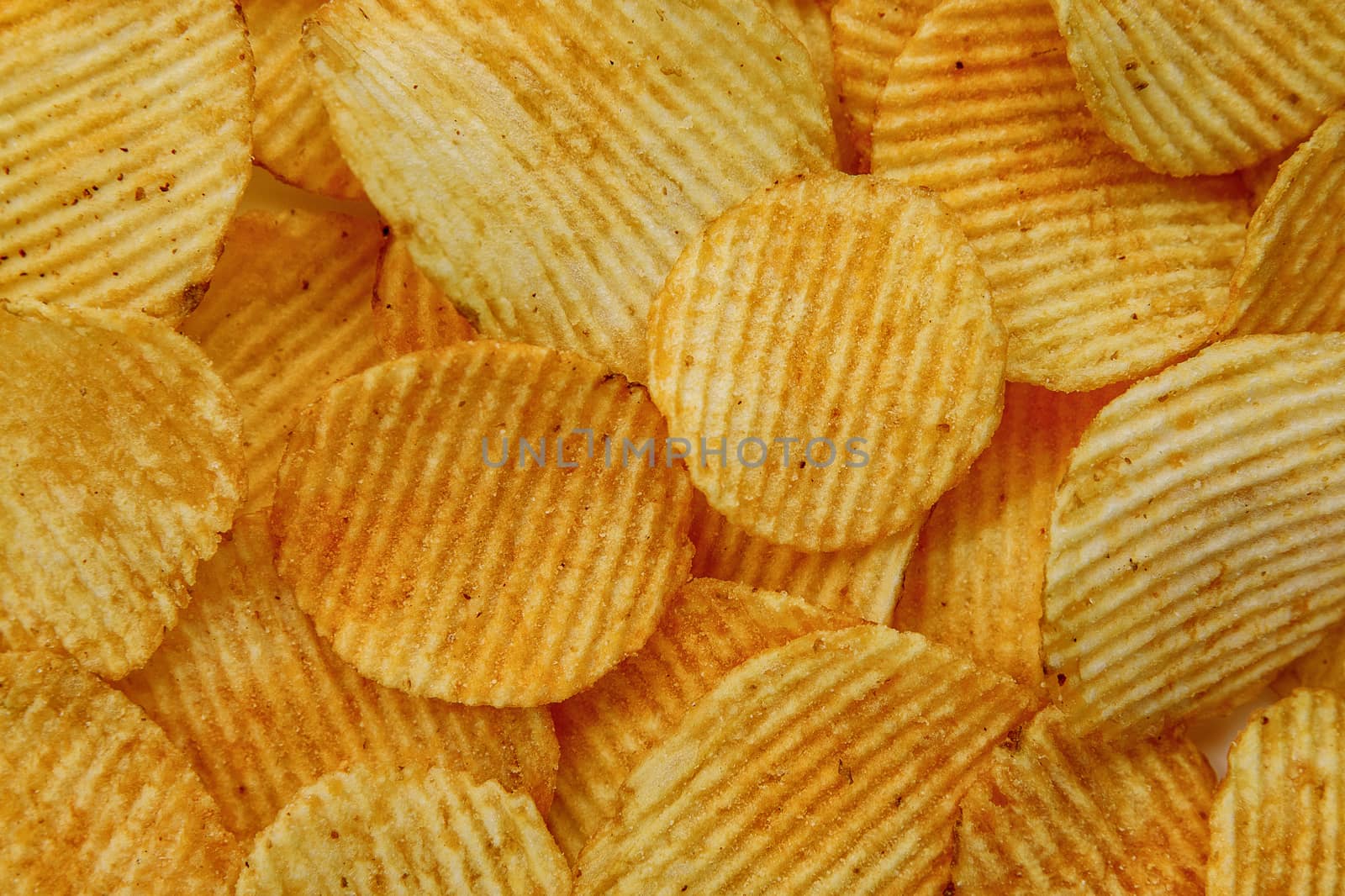 Corrugated Potato Chips. Food background. Top view. by 9parusnikov