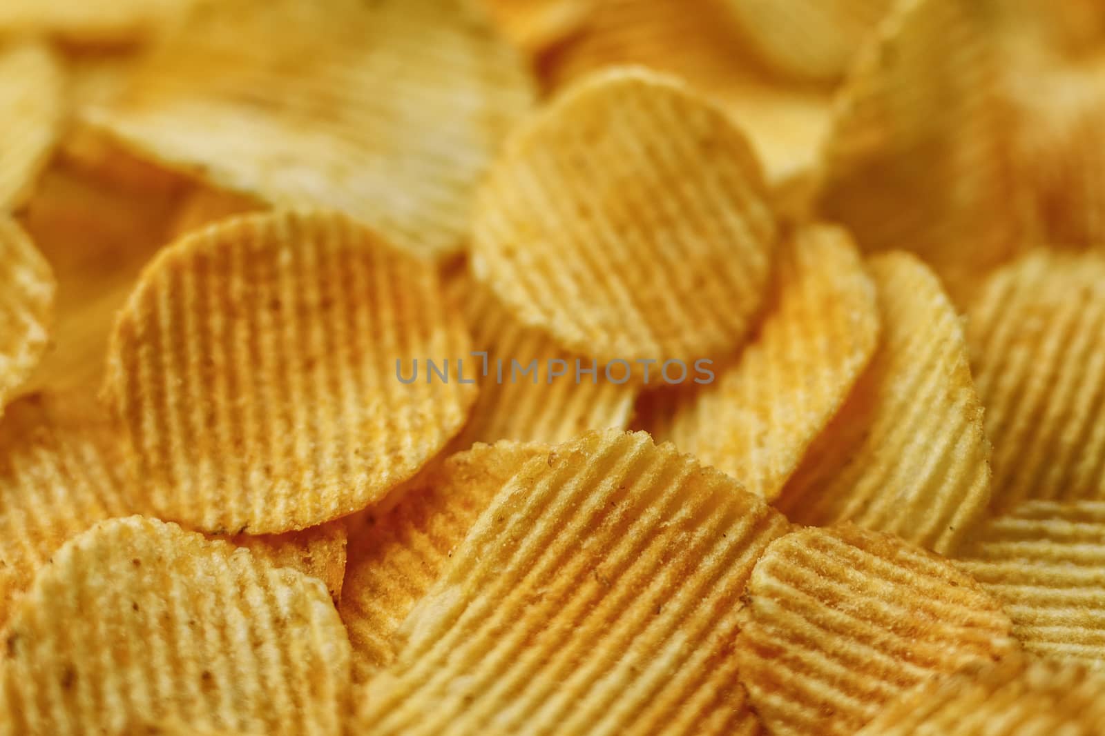 Corrugated Potato Chips. Food background. Top view. by 9parusnikov